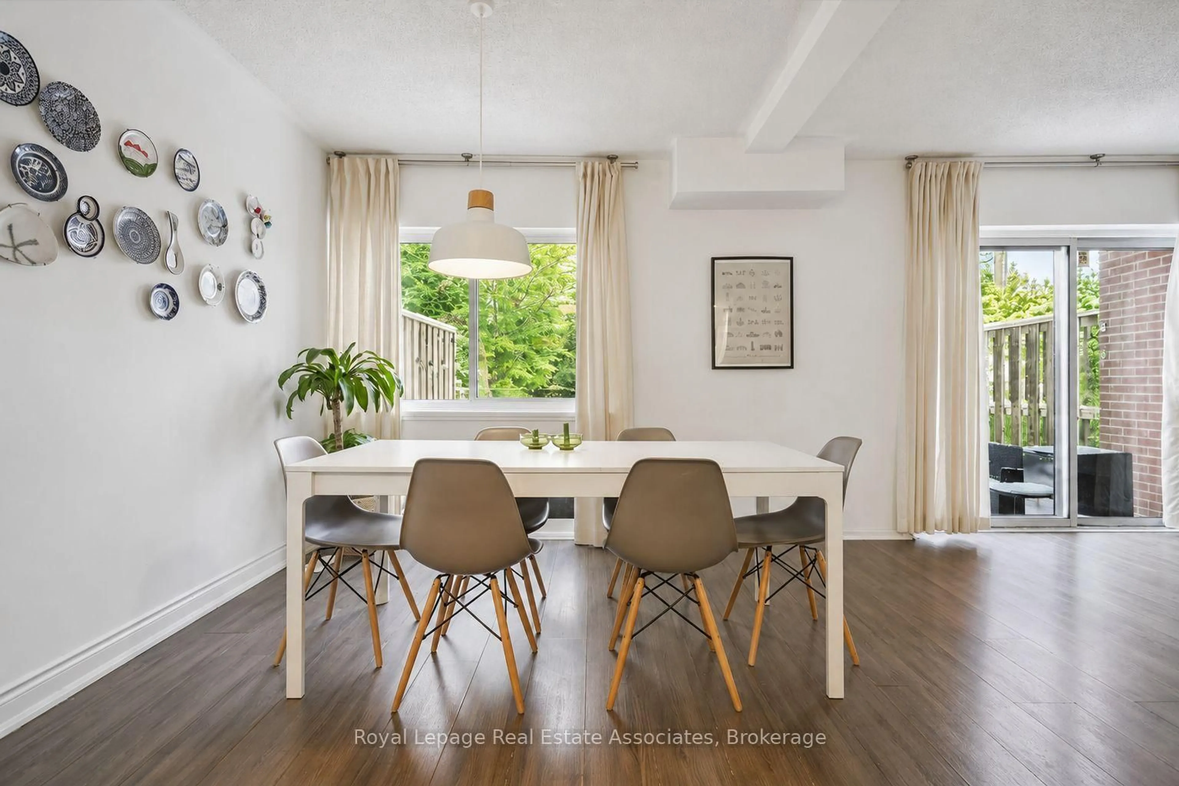 Dining room, wood/laminate floor for 1230 Gripsholm Rd #17, Mississauga Ontario L4Y 2G9
