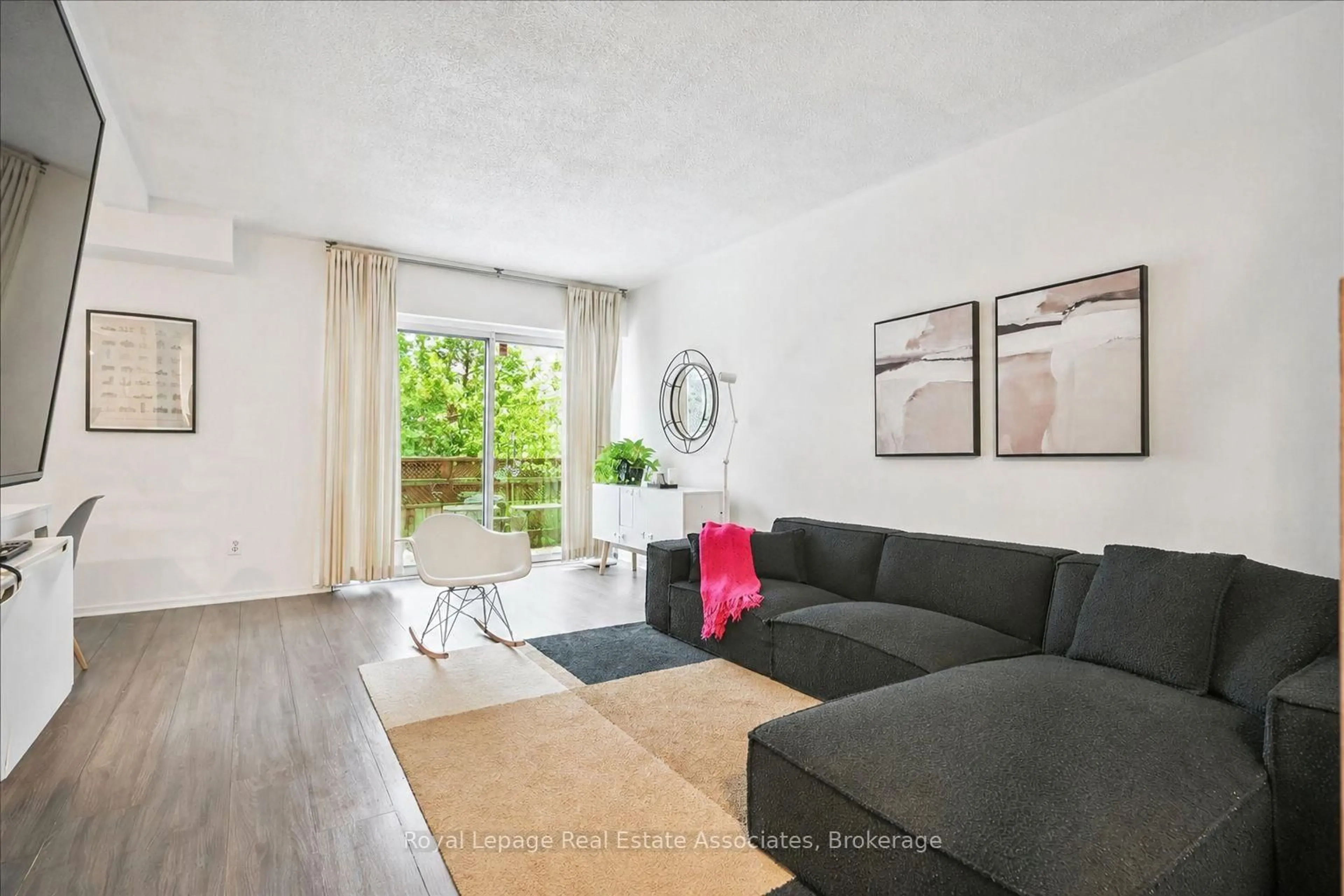 Living room with furniture, unknown for 1230 Gripsholm Rd #17, Mississauga Ontario L4Y 2G9