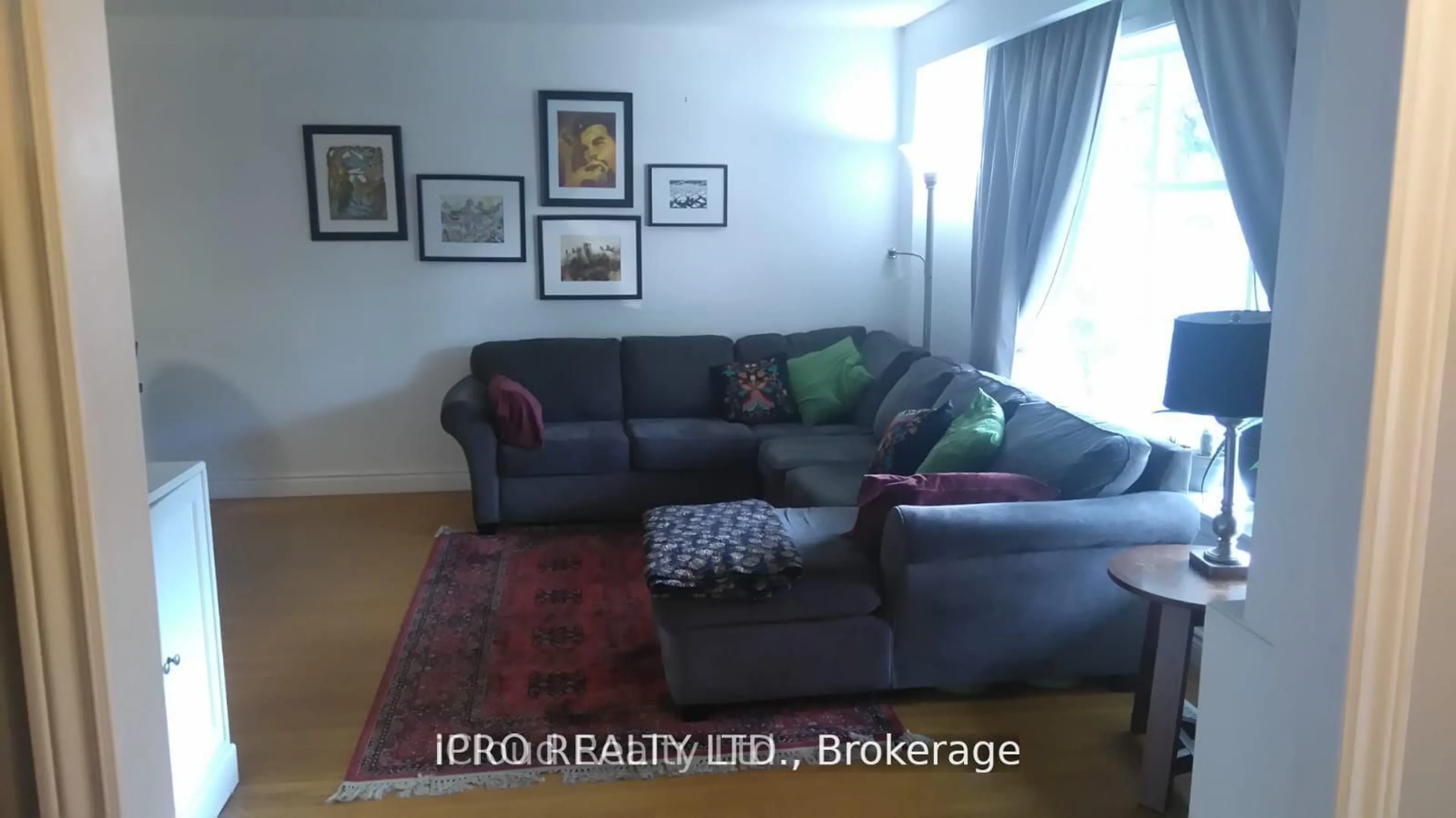 Living room with furniture, unknown for 62 Ambleside Dr, Brampton Ontario L6Y 1B9
