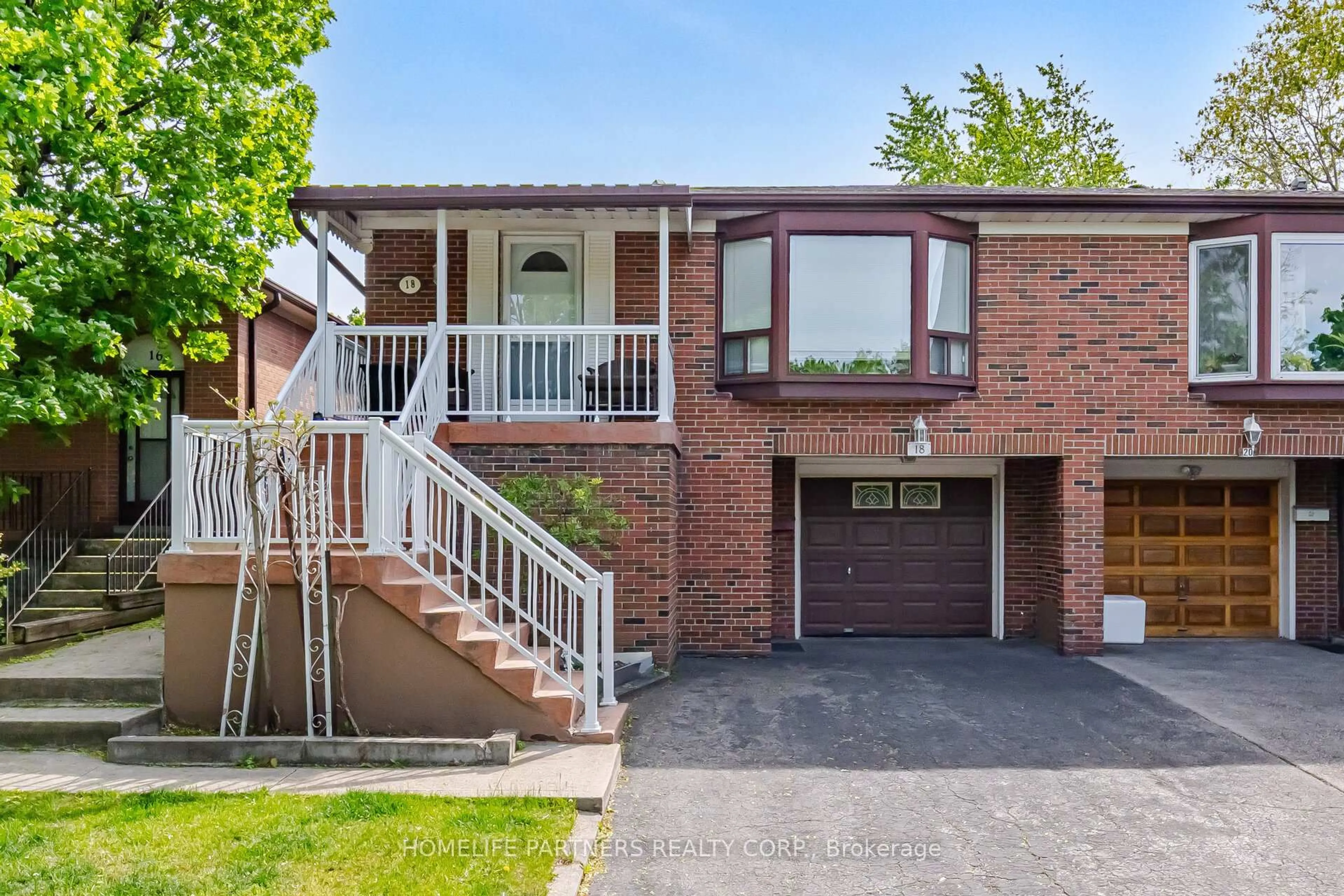 Home with brick exterior material, street for 18 Zealand Rd, Toronto Ontario M9R 3W4