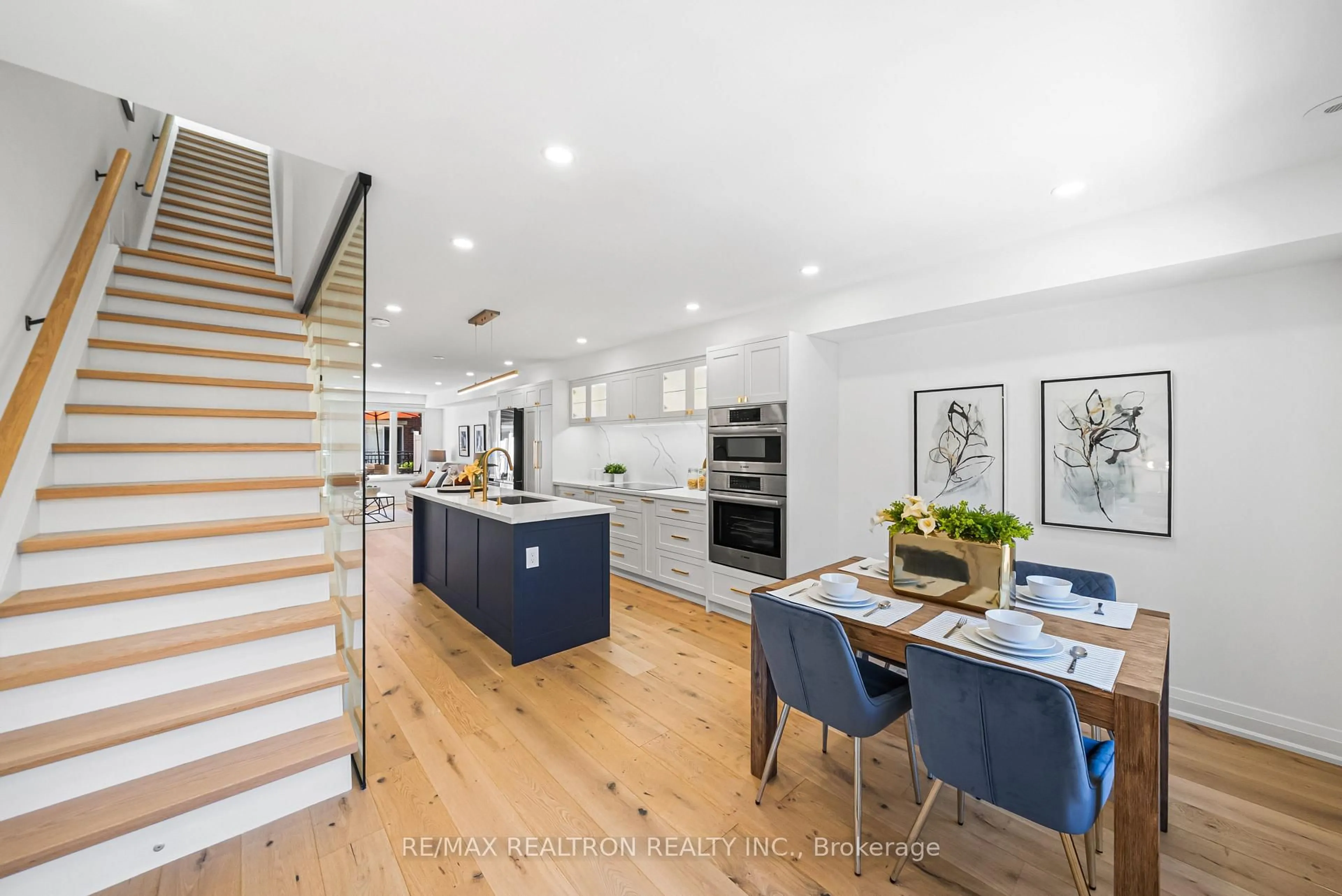 Open concept kitchen, wood/laminate floor for 25 Laidlaw St #506, Toronto Ontario M6K 1X3