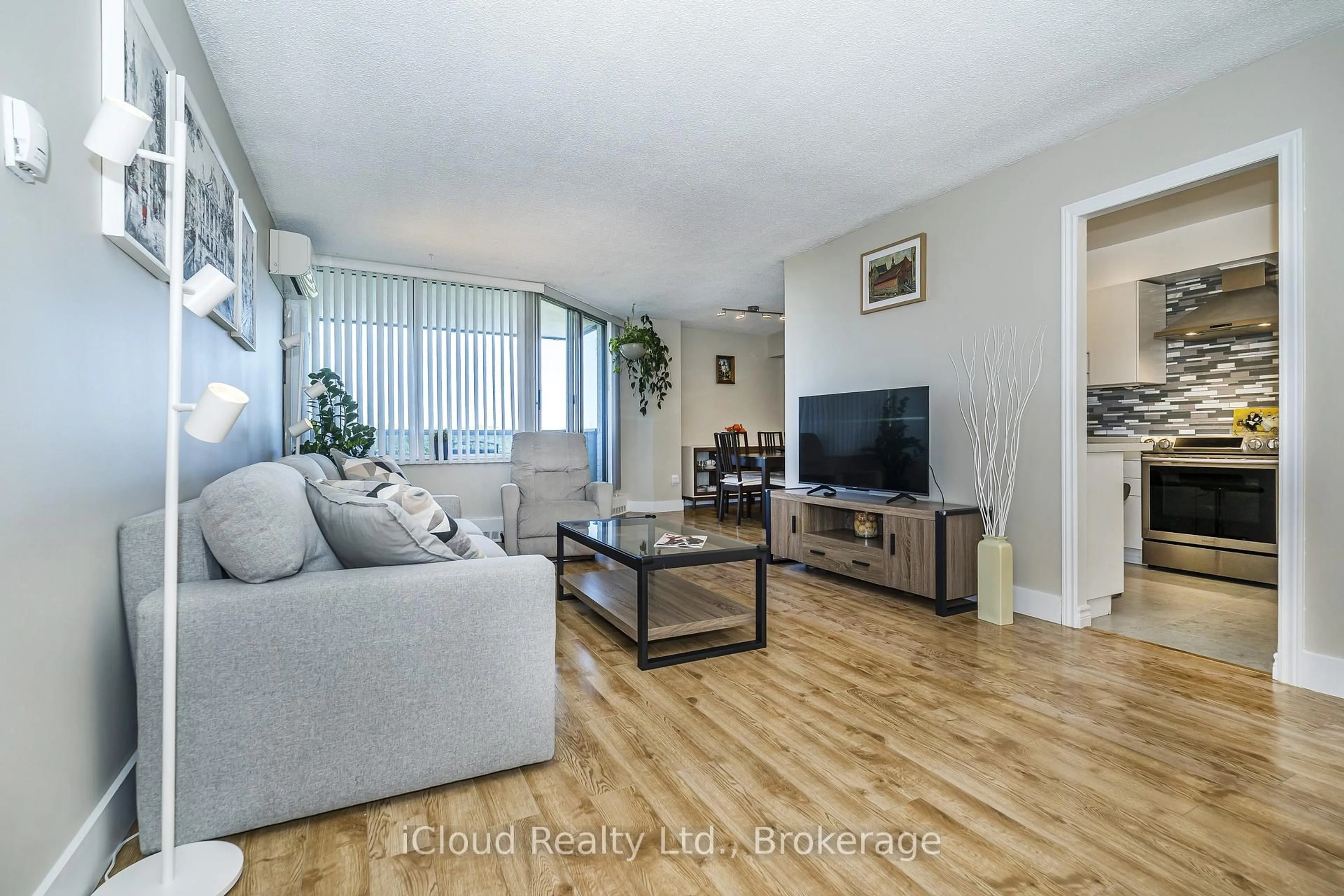 Living room with furniture, unknown for 420 Mill Rd #1007, Toronto Ontario M9C 1Z1