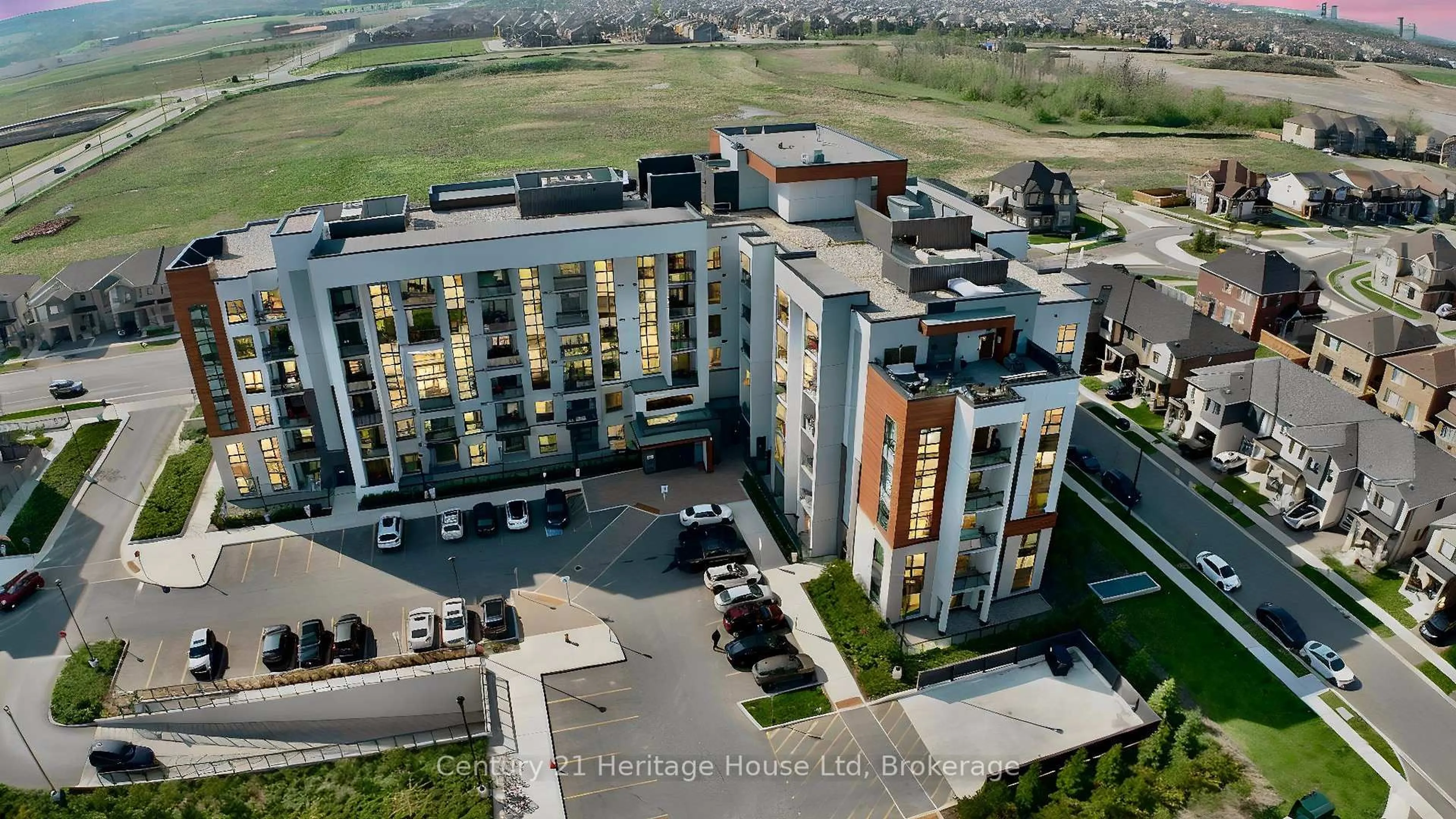 A pic from outside/outdoor area/front of a property/back of a property/a pic from drone, unknown for 460 Gordon Krantz Ave #604, Milton Ontario L9E 1N9