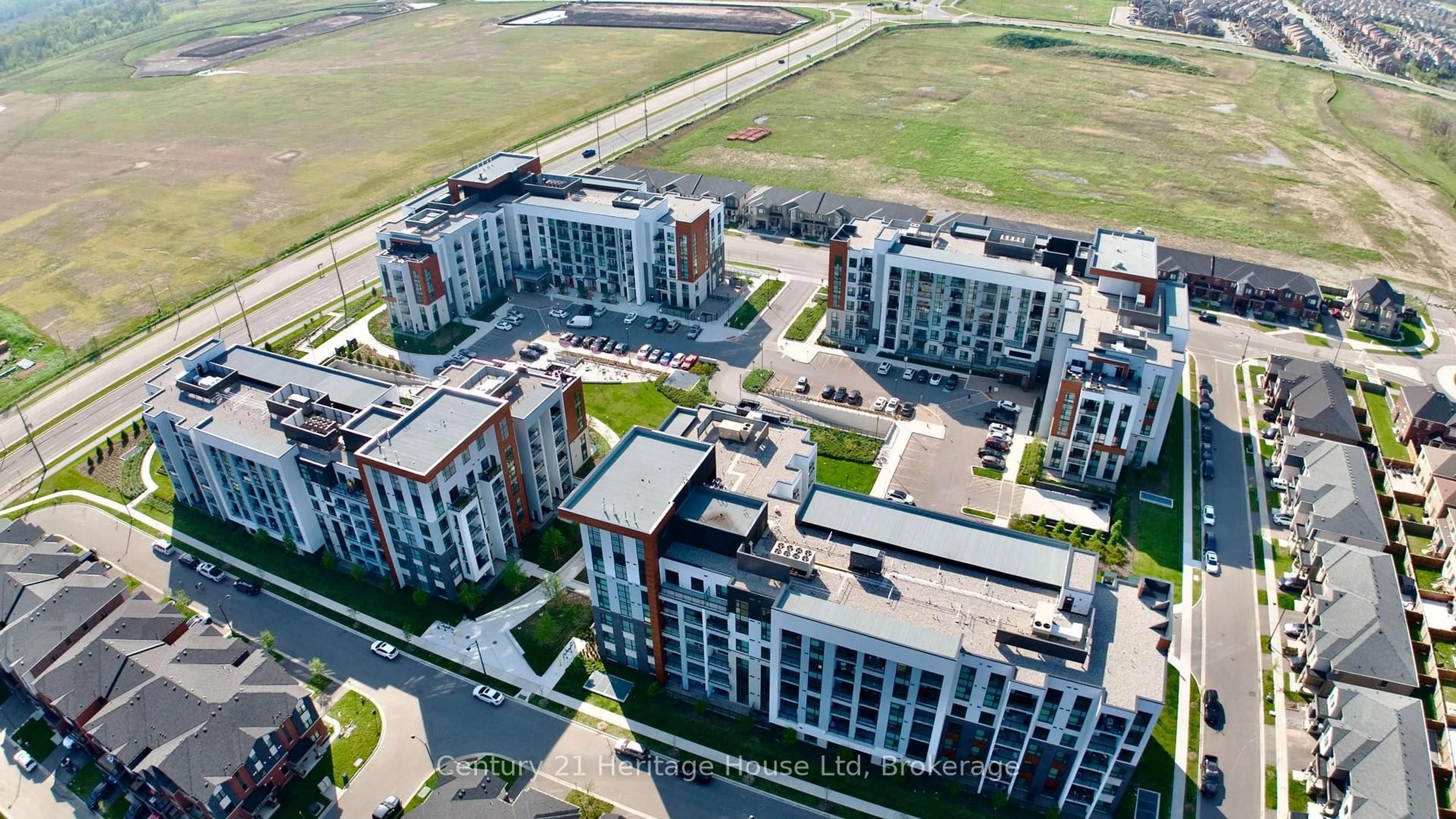 A pic from outside/outdoor area/front of a property/back of a property/a pic from drone, city buildings view from balcony for 460 Gordon Krantz Ave #604, Milton Ontario L9E 1N9