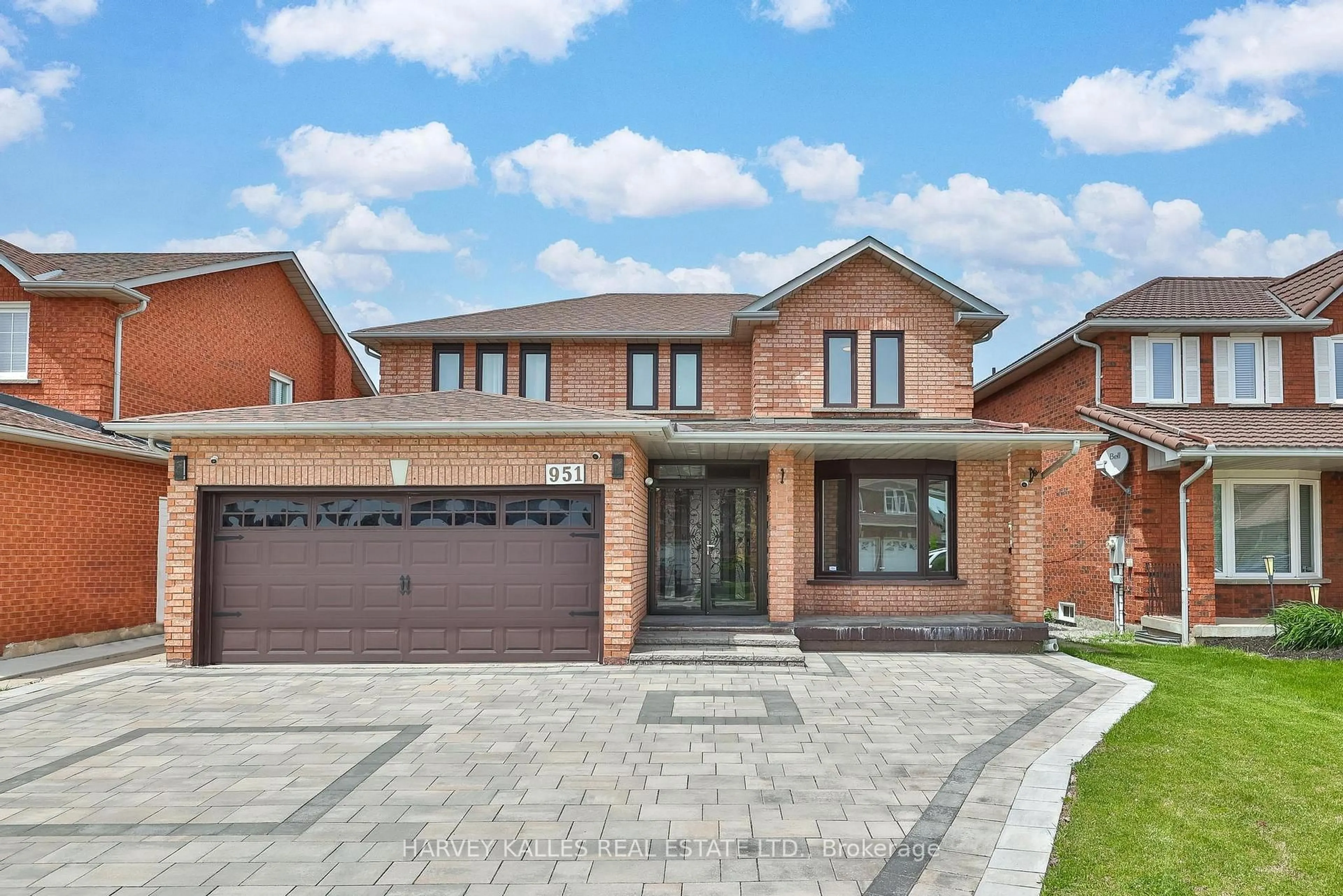 Home with brick exterior material, street for 951 White Clover Way, Mississauga Ontario L5V 1E7