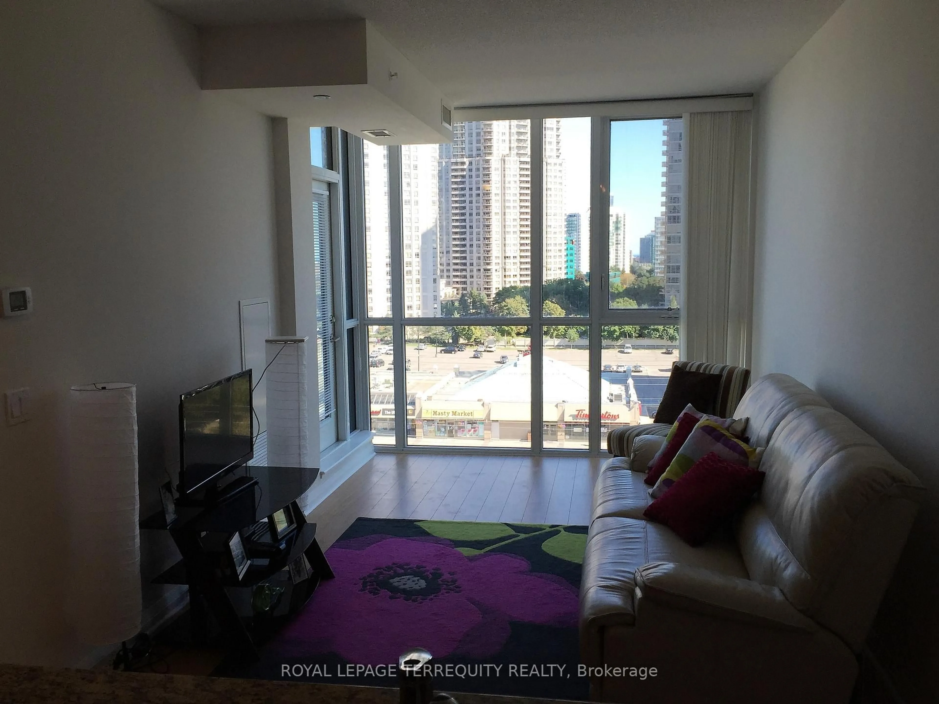 Living room with furniture, unknown for 75 Eglinton Ave #703, Mississauga Ontario L5R 0E5