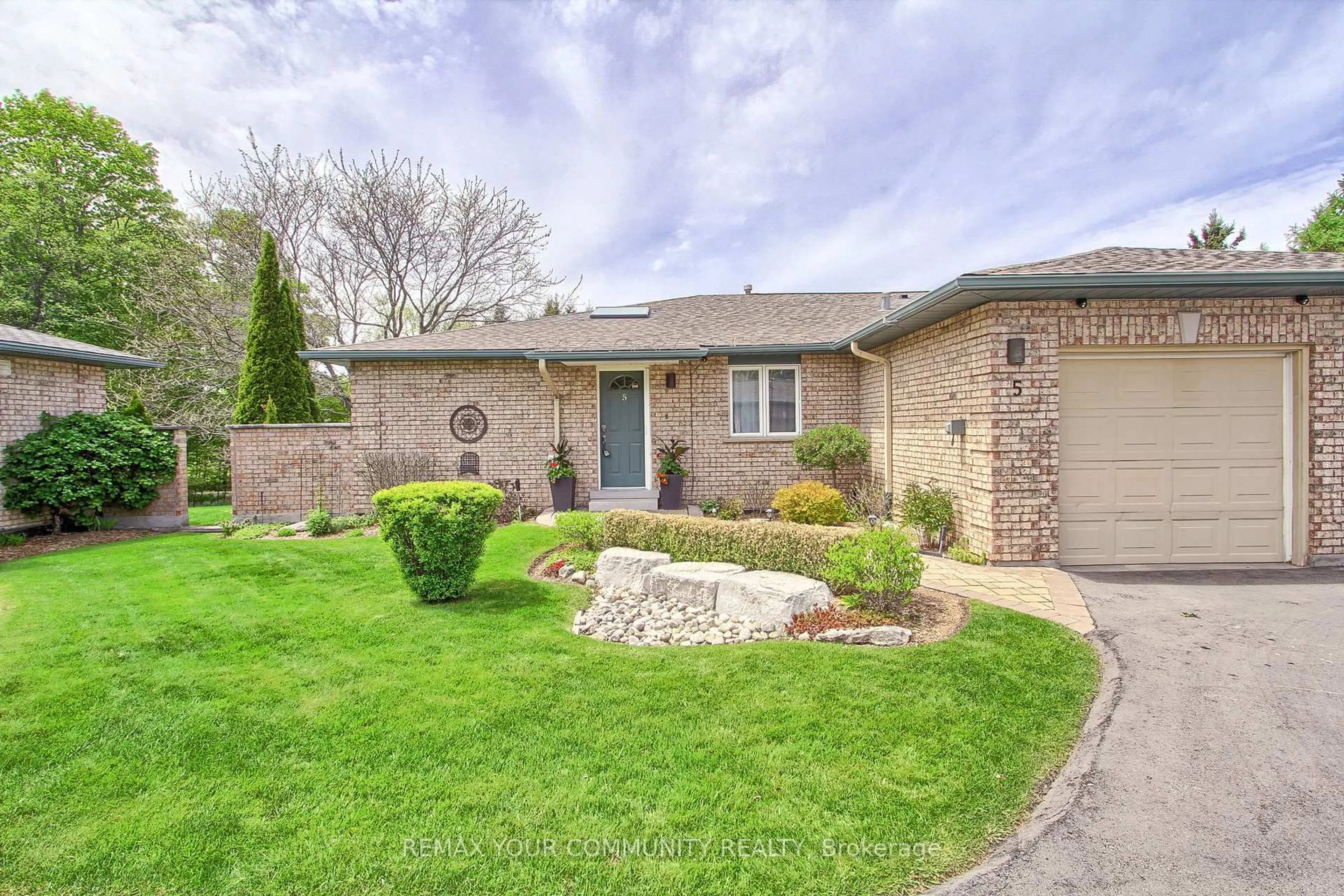 Home with brick exterior material, street for 23 Reddington Dr #5, Caledon Ontario L7E 0E4