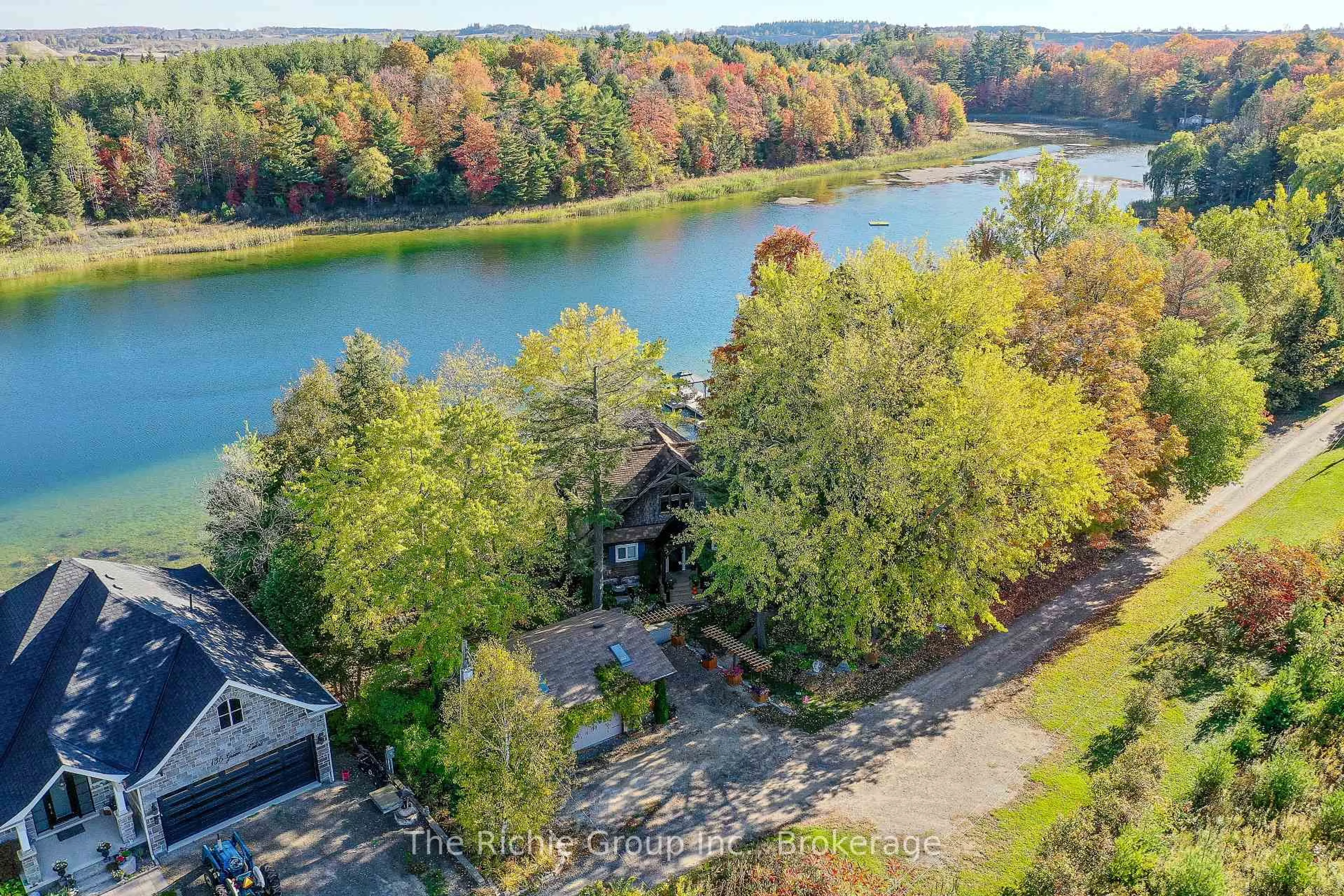 A pic from outside/outdoor area/front of a property/back of a property/a pic from drone, water/lake/river/ocean view for 143 Green Lake Rd, Caledon Ontario L7K 0S4