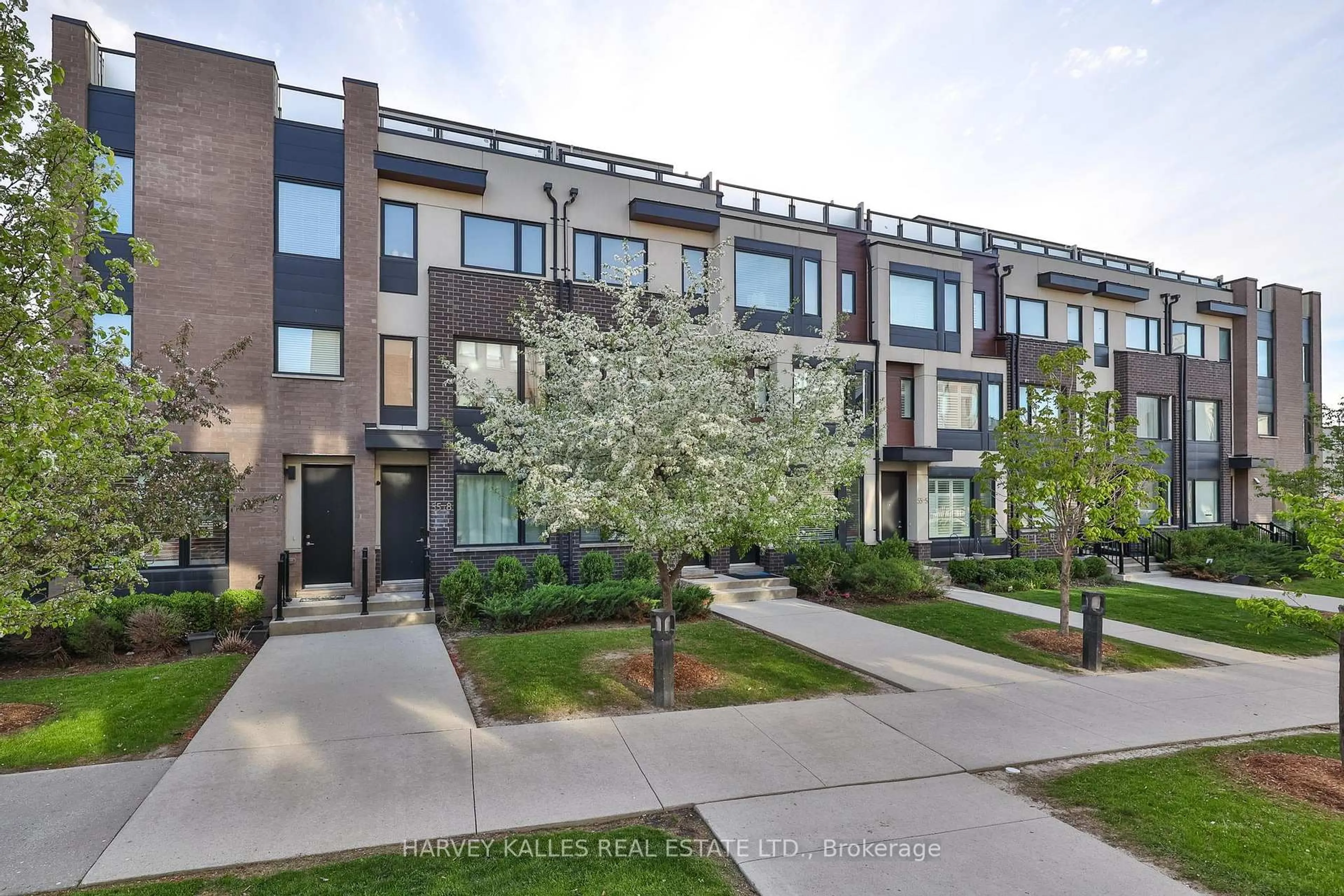 A pic from outside/outdoor area/front of a property/back of a property/a pic from drone, street for 55 Thomas Mulholland Dr #9, Toronto Ontario M3K 0A5