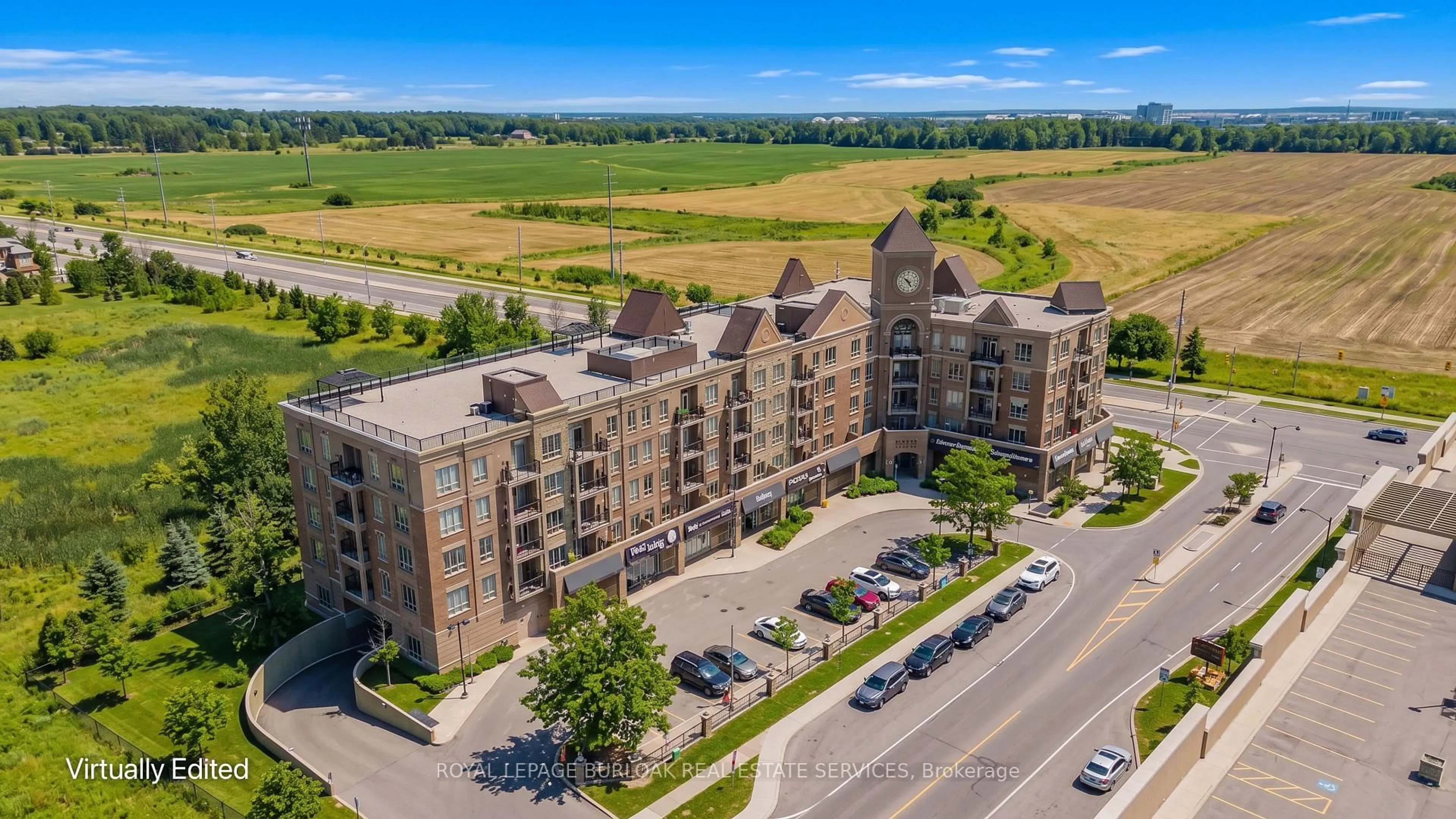 A pic from outside/outdoor area/front of a property/back of a property/a pic from drone, building for 5327 Upper Middle Rd #205, Burlington Ontario L7L 0E9