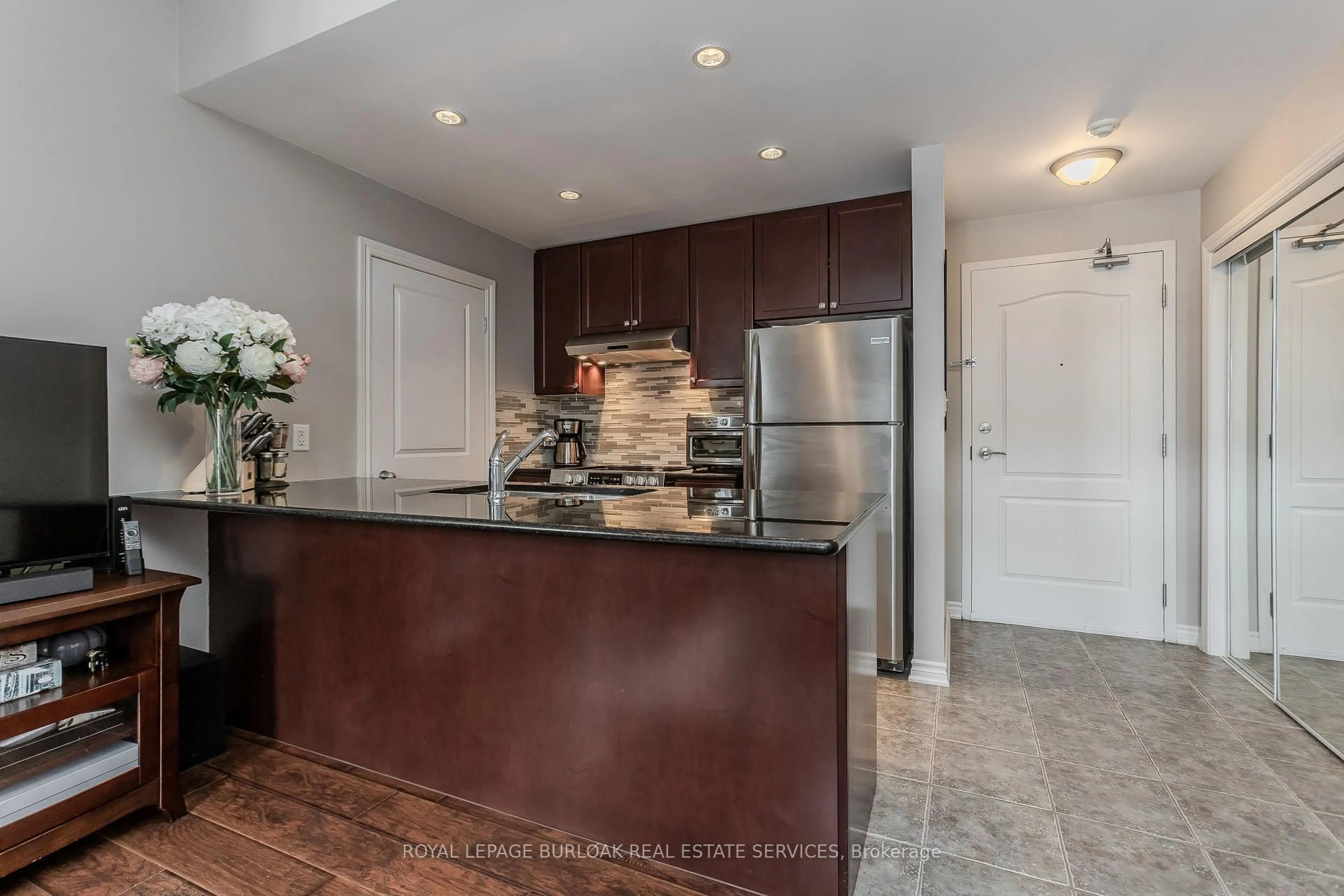 Open concept kitchen, ceramic/tile floor for 5327 Upper Middle Rd #205, Burlington Ontario L7L 0E9
