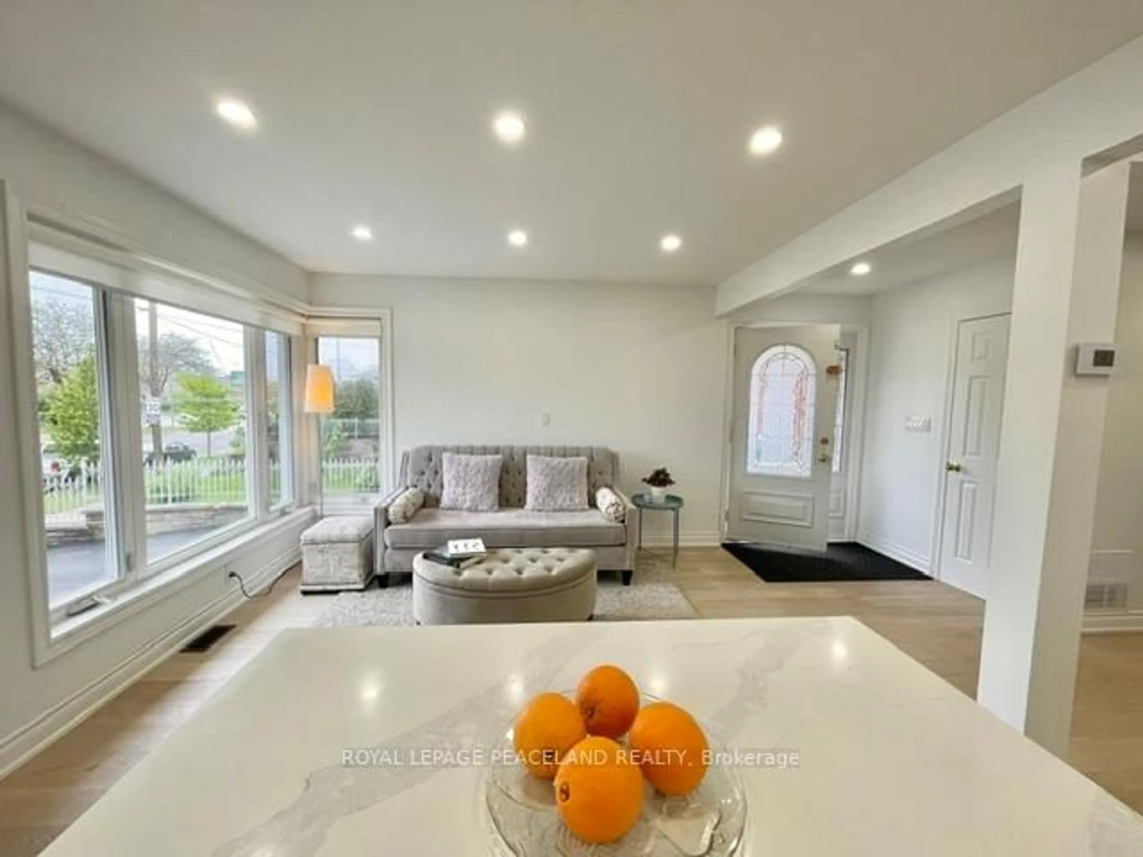 Living room with furniture, unknown for 24 Yarn Rd, Toronto Ontario M9B 1H5