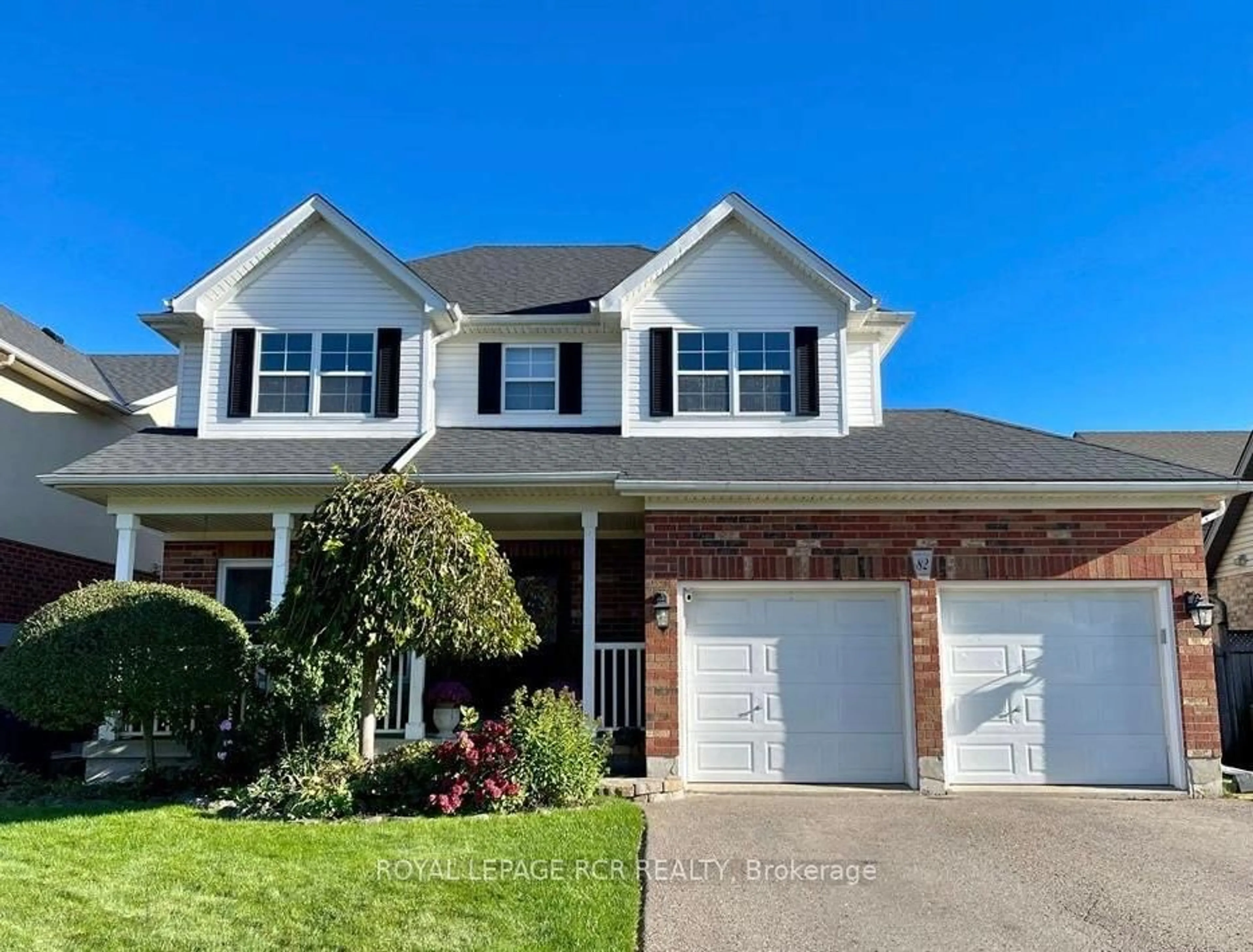 Home with vinyl exterior material, street for 82 Spencer Ave, Orangeville Ontario L9W 5H8