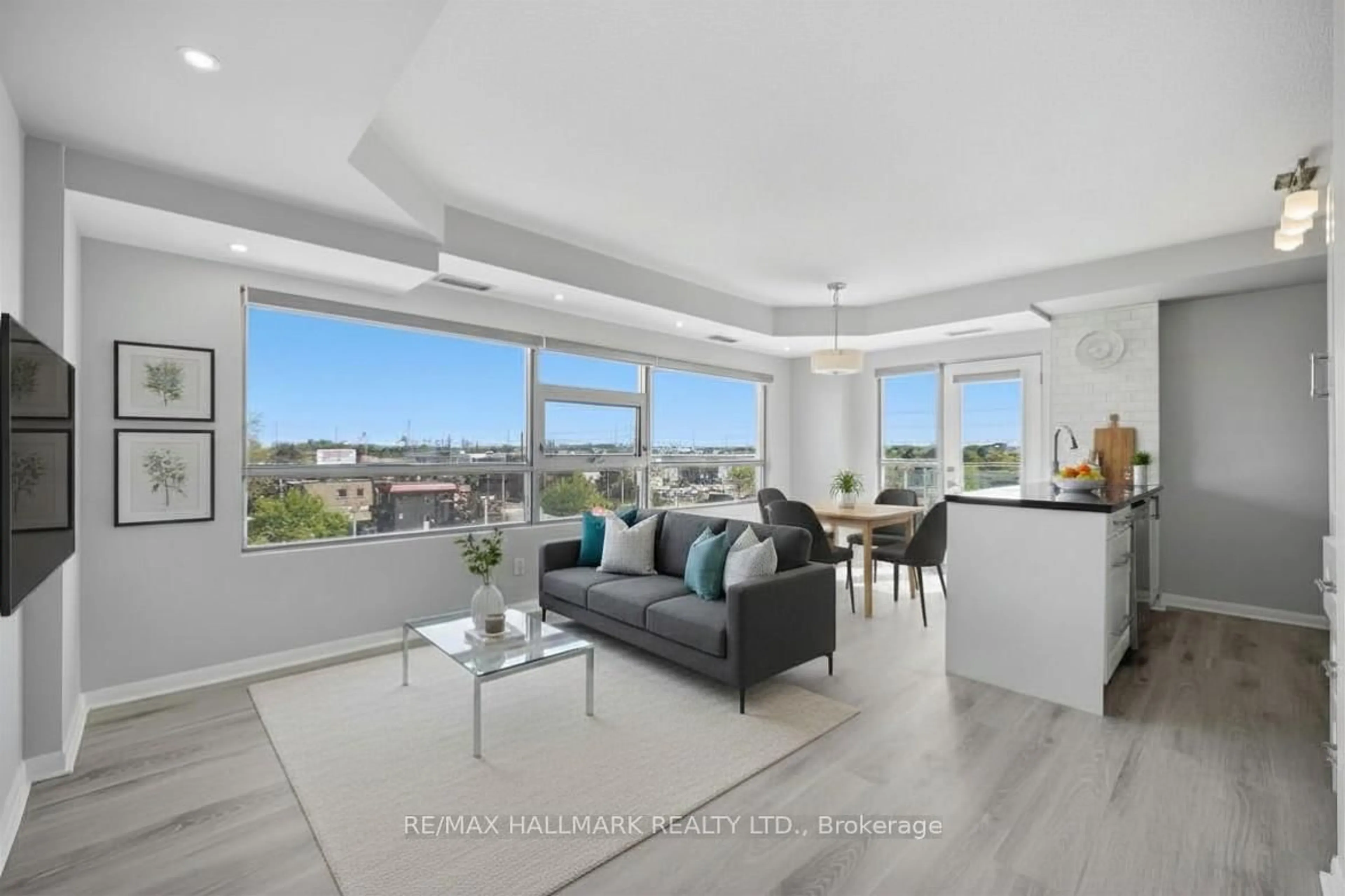 Living room with furniture, unknown for 2464 Weston Rd #403, Toronto Ontario M9N 0A2