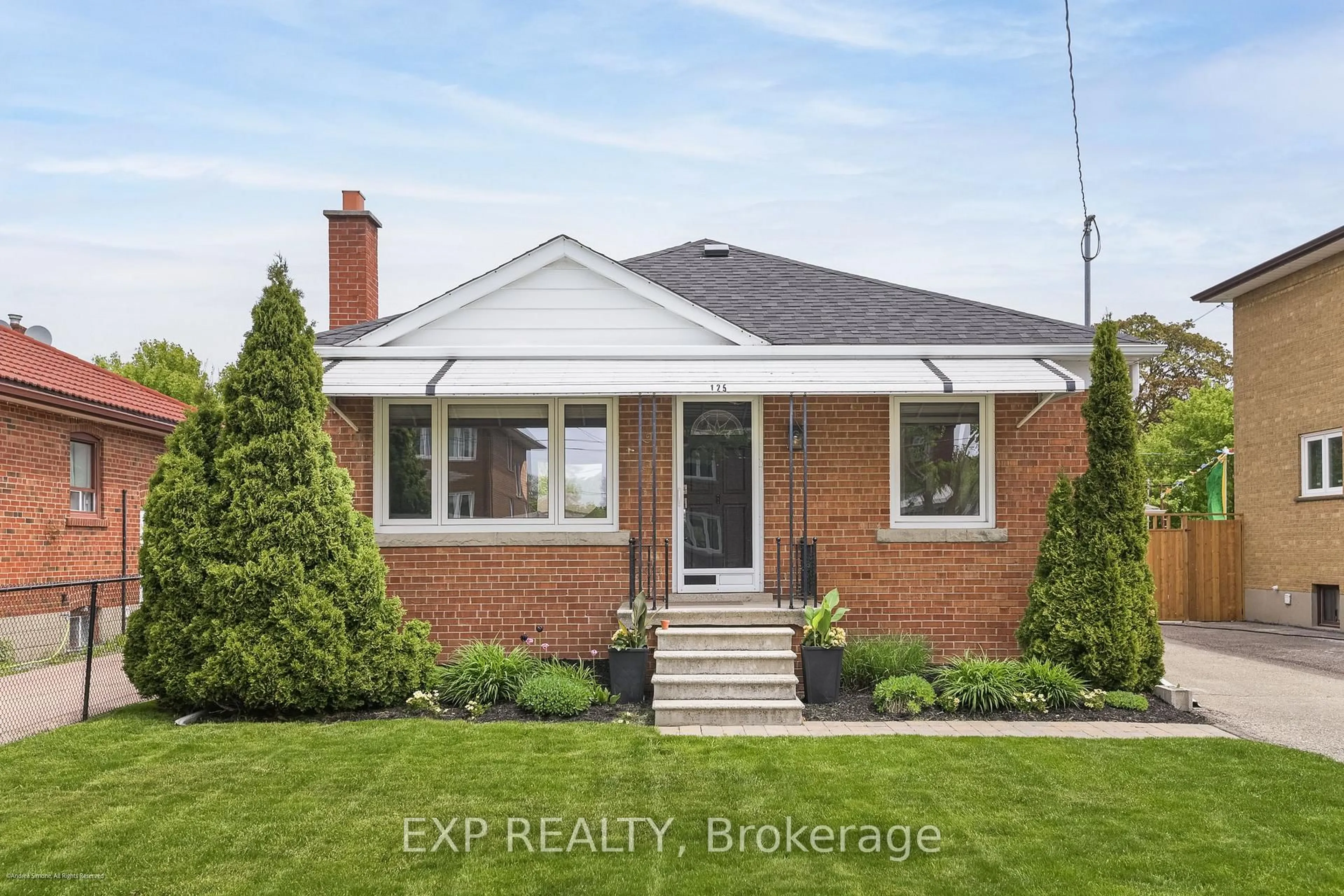 Home with brick exterior material, street for 125 Treeview Dr, Toronto Ontario M8W 4C4