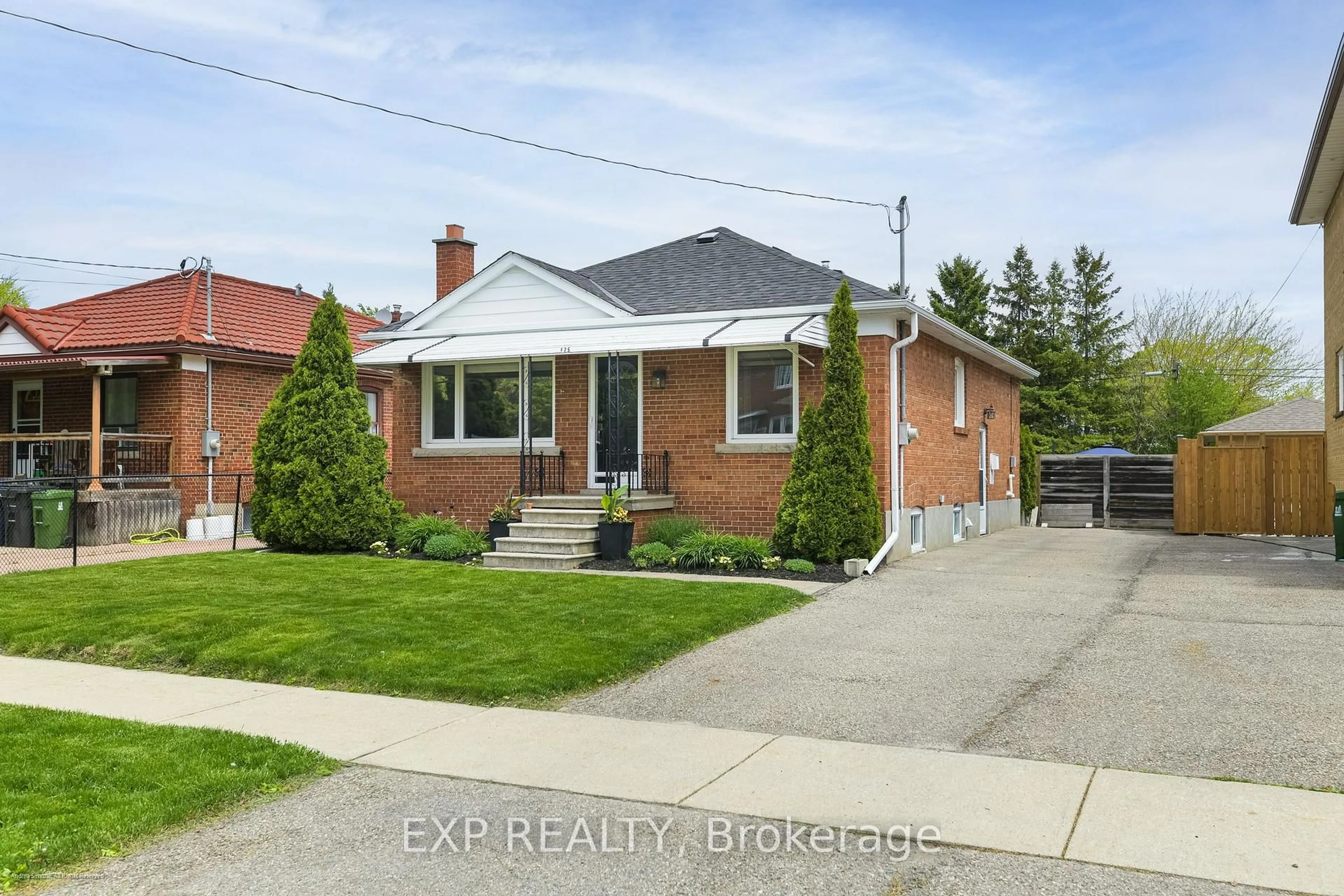 Home with brick exterior material, street for 125 Treeview Dr, Toronto Ontario M8W 4C4