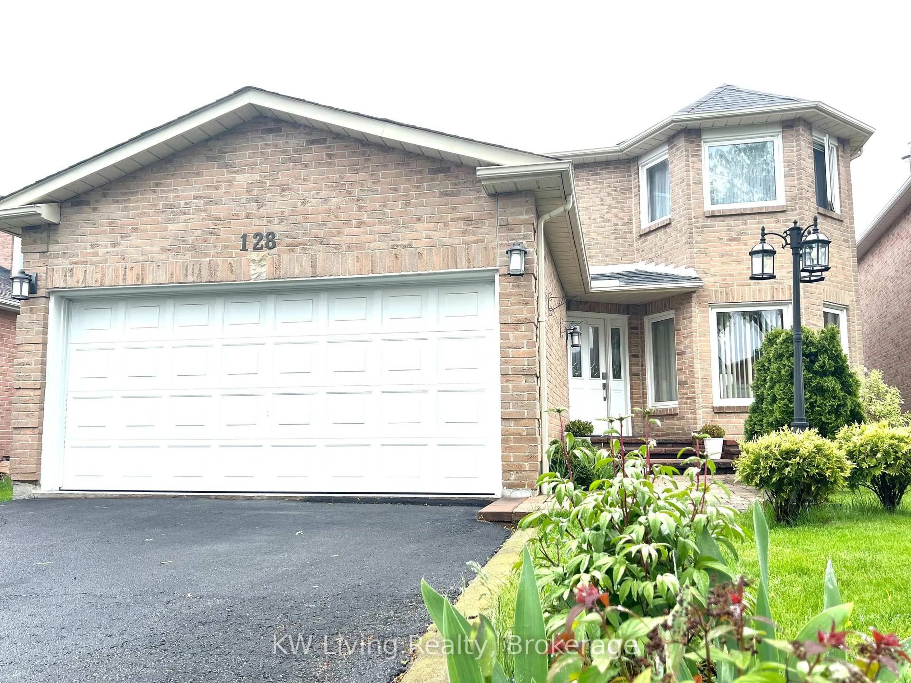 Home with brick exterior material, street for 128 Palomino Dr, Mississauga Ontario L4Z 3G5