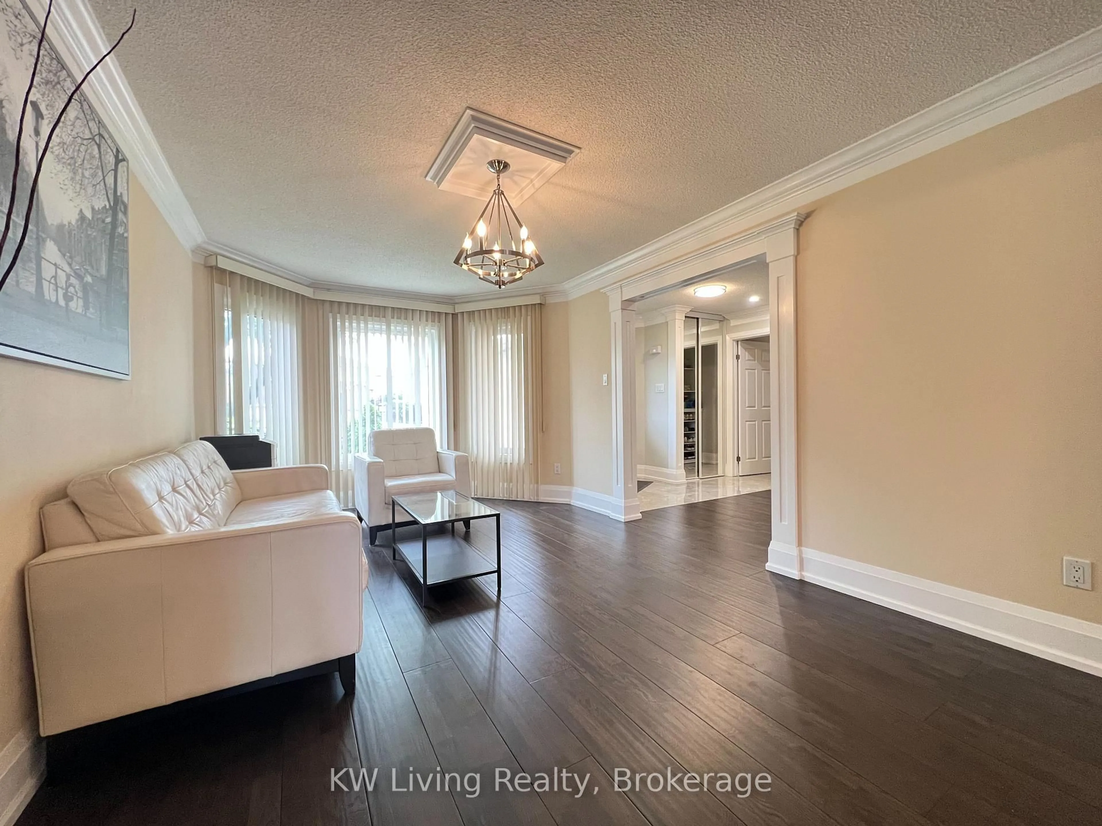 Living room with furniture, wood/laminate floor for 128 Palomino Dr, Mississauga Ontario L4Z 3G5