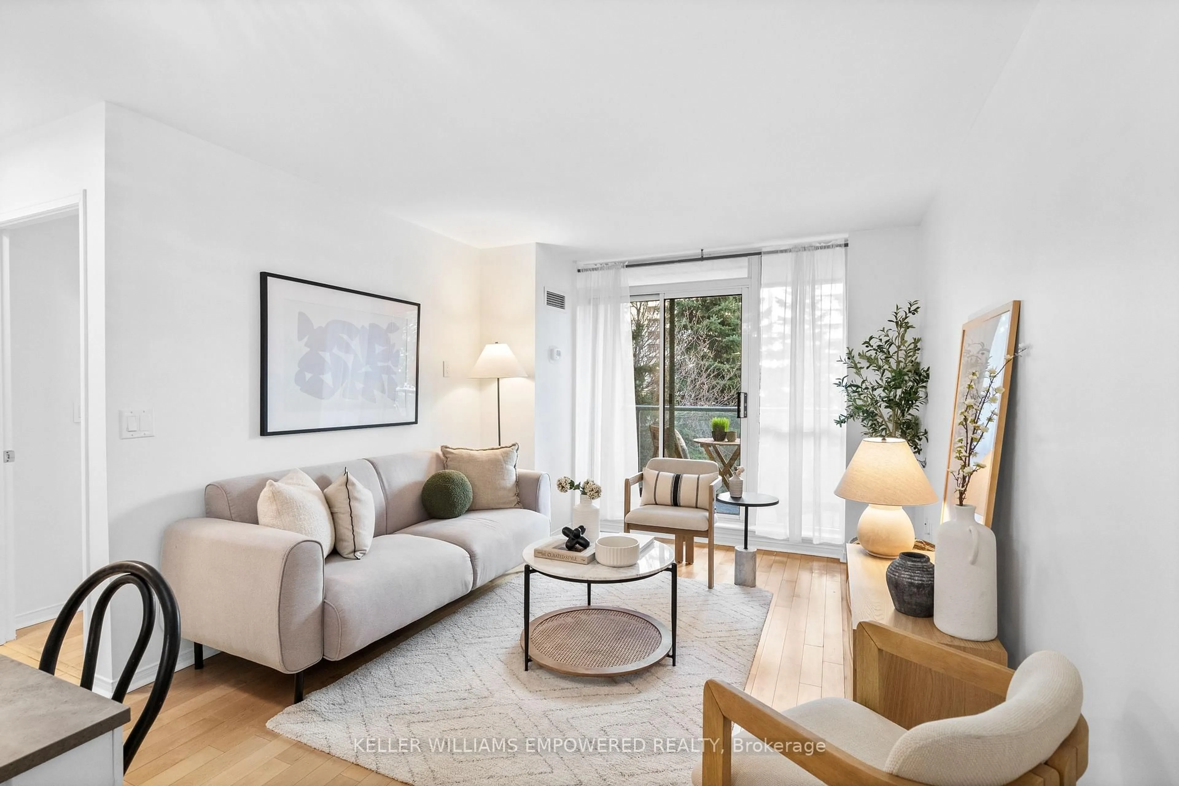 Living room with furniture, unknown for 17 Michael Power Pl #201, Toronto Ontario M9A 5G5