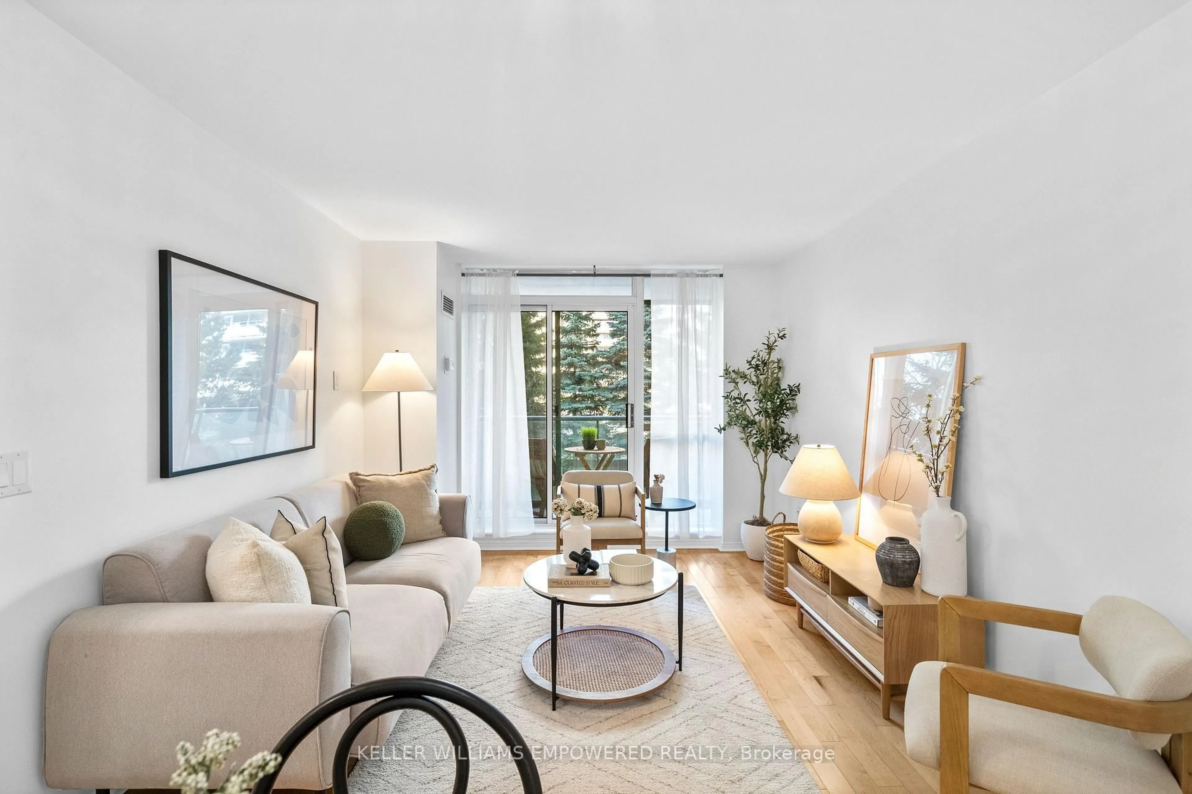 Living room with furniture, unknown for 17 Michael Power Pl #201, Toronto Ontario M9A 5G5