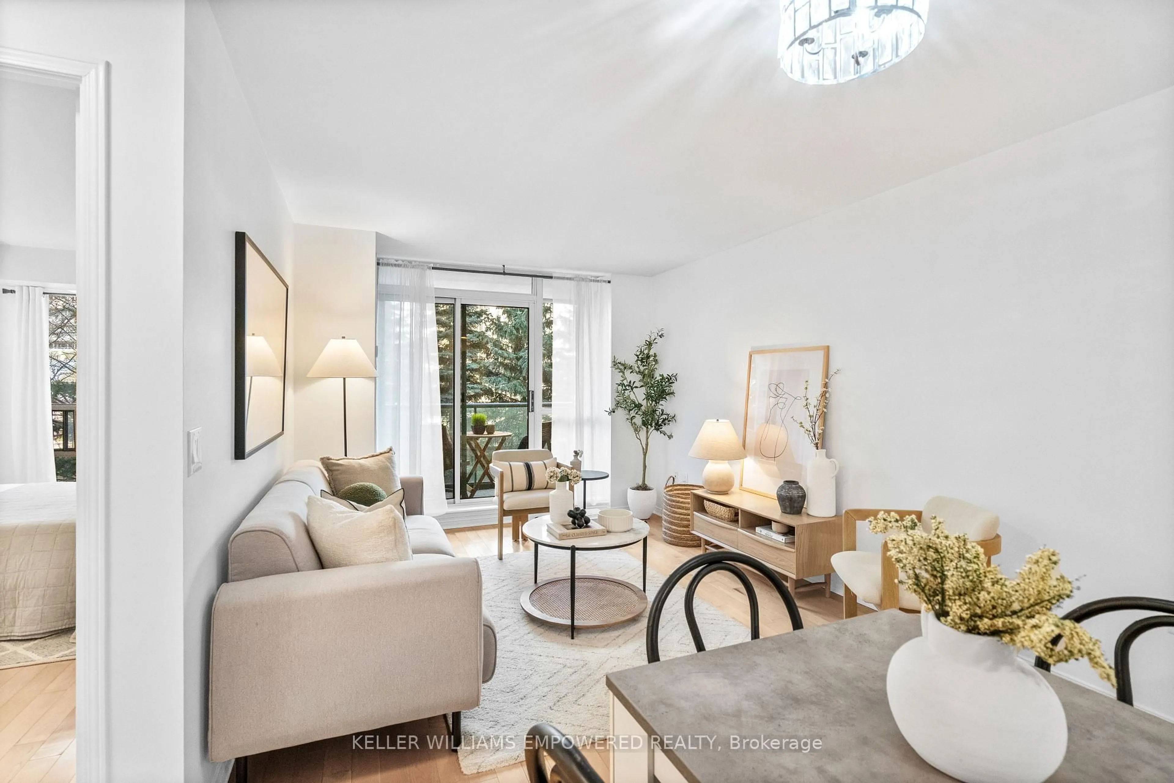 Living room with furniture, unknown for 17 Michael Power Pl #201, Toronto Ontario M9A 5G5