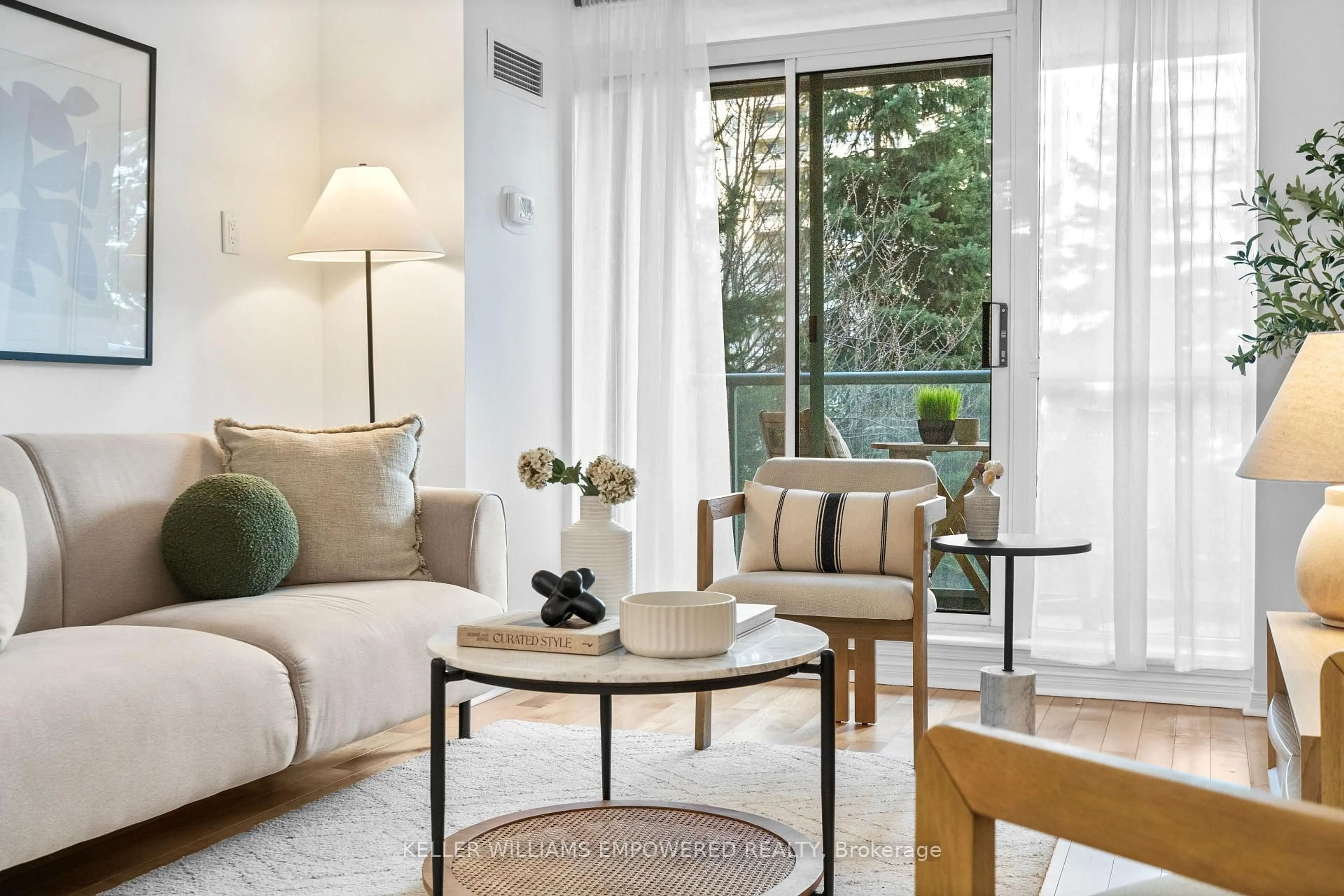 Living room with furniture, unknown for 17 Michael Power Pl #201, Toronto Ontario M9A 5G5