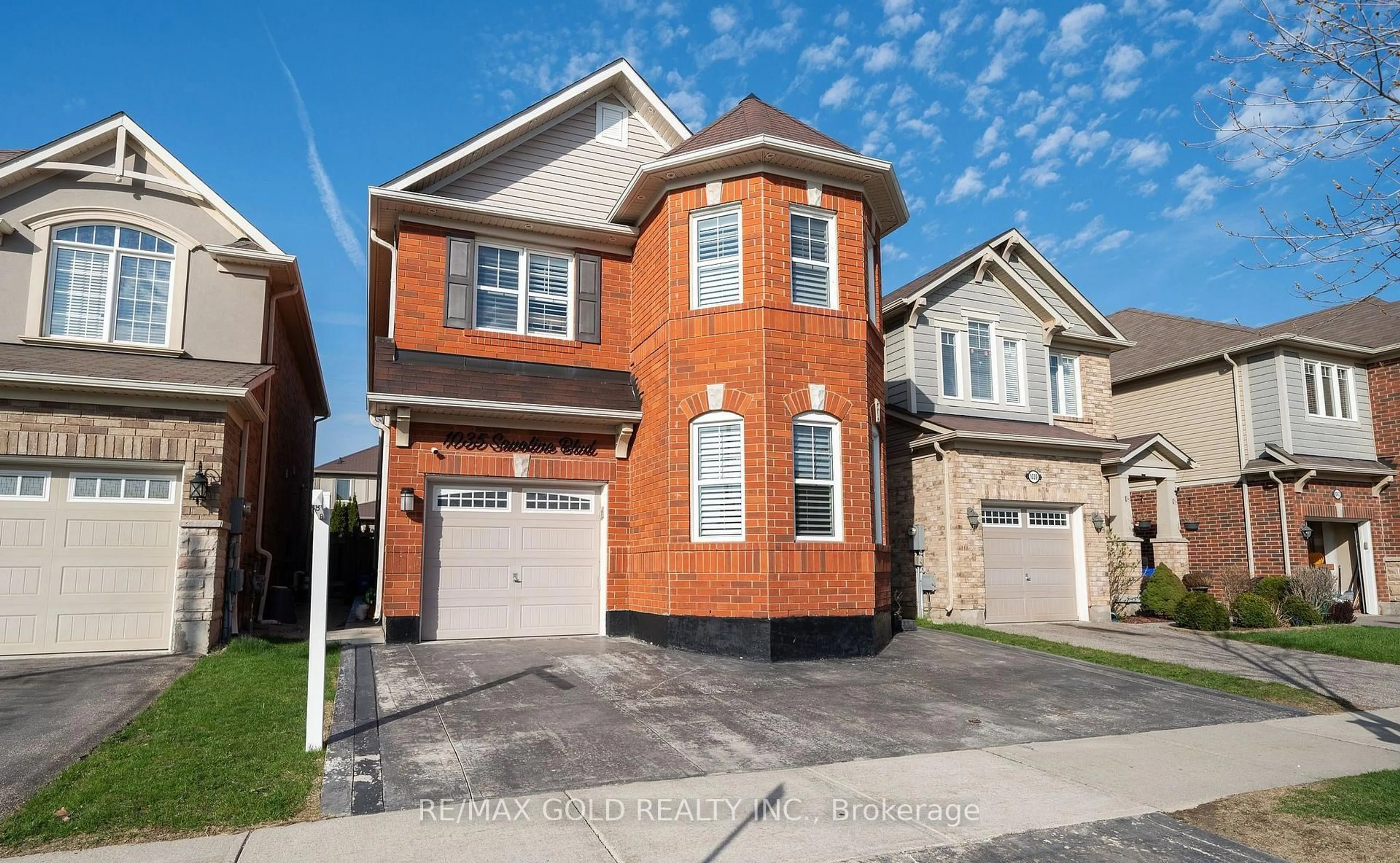 Home with brick exterior material, street for 1035 SAVOLINE Blvd, Milton Ontario L9T 8P2
