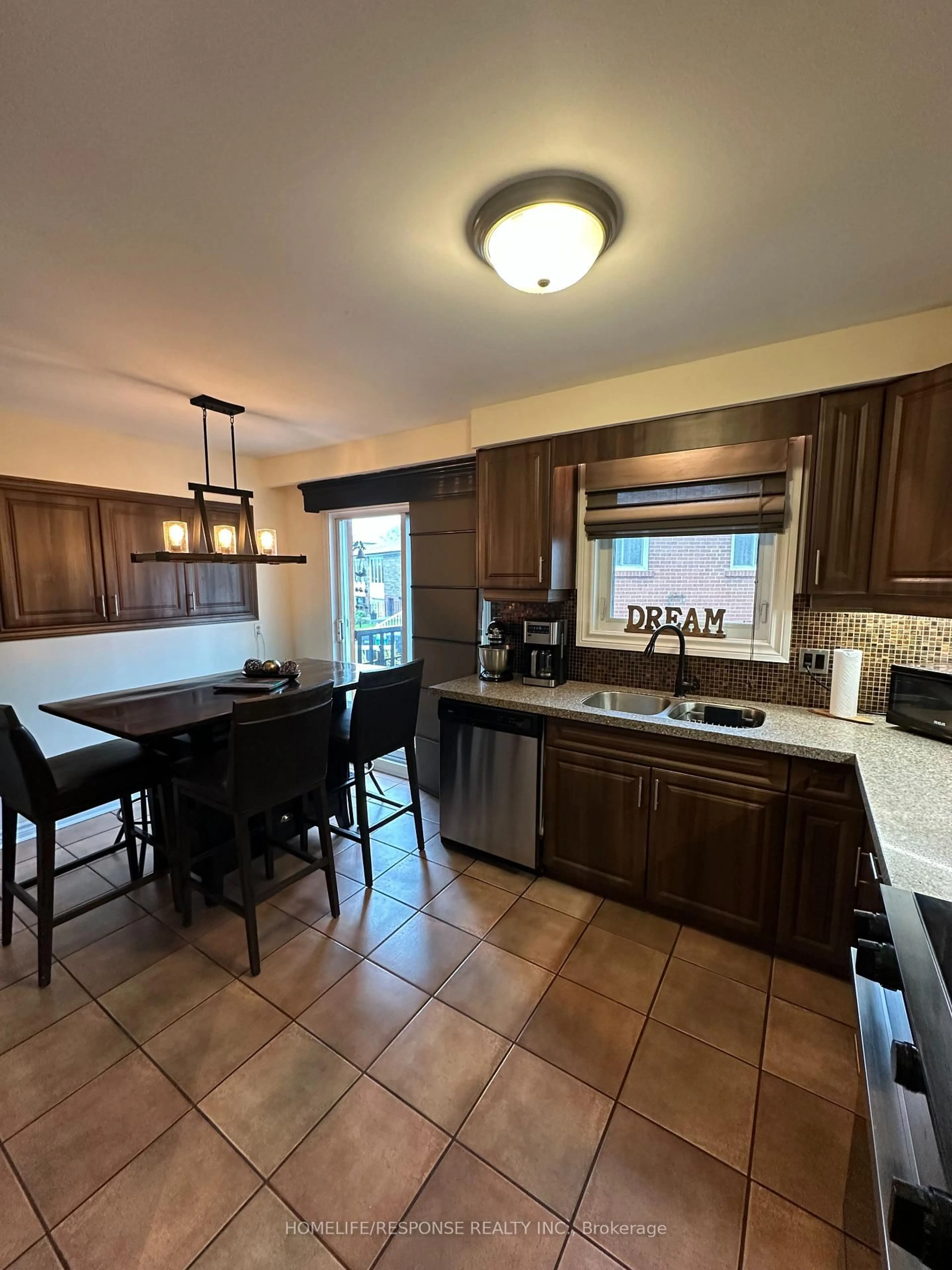 Open concept kitchen, ceramic/tile floor for 3430 Homark Dr, Mississauga Ontario L4Y 2K7