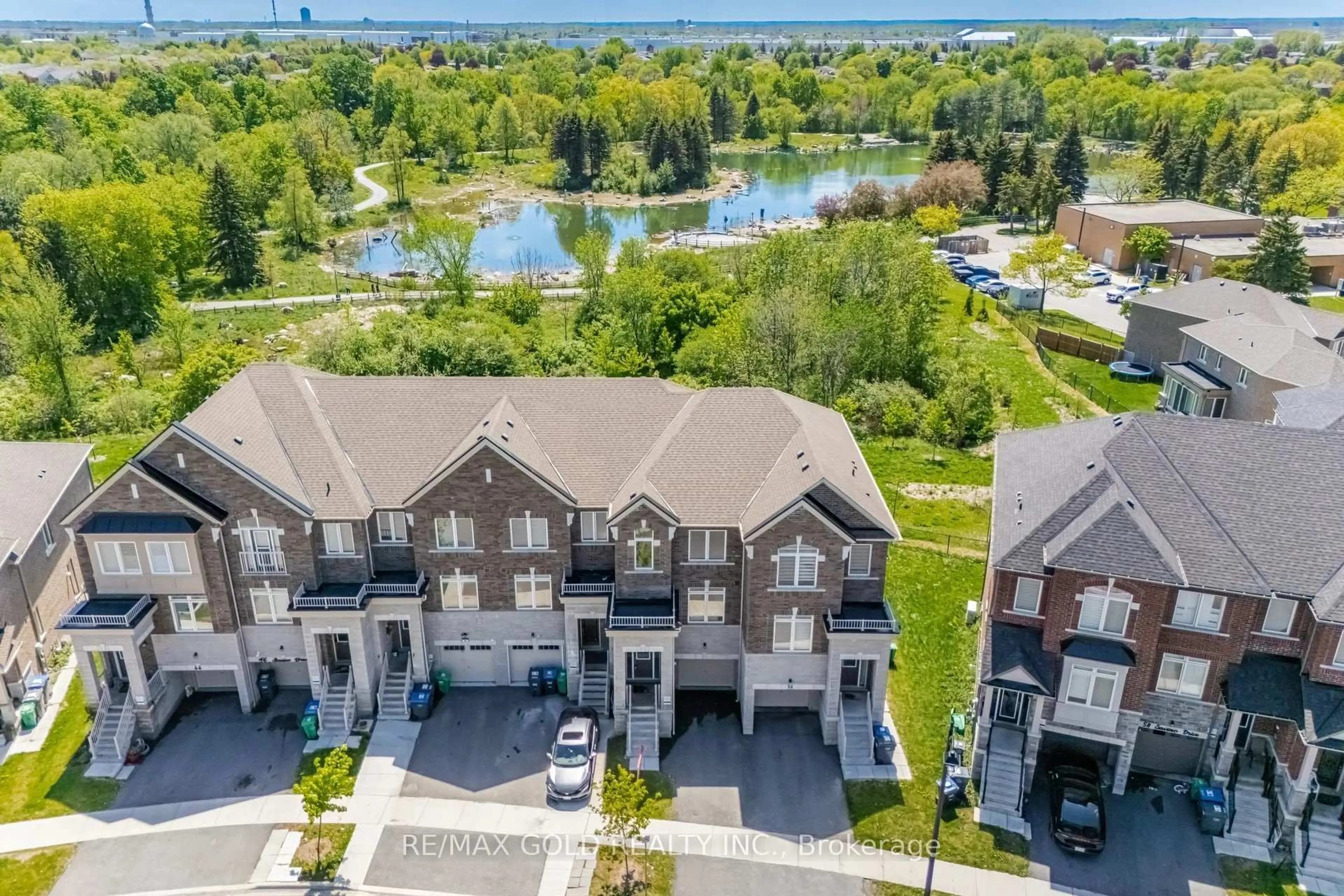 A pic from outside/outdoor area/front of a property/back of a property/a pic from drone, water/lake/river/ocean view for 52 Savino Dr, Brampton Ontario L6Z 0J7