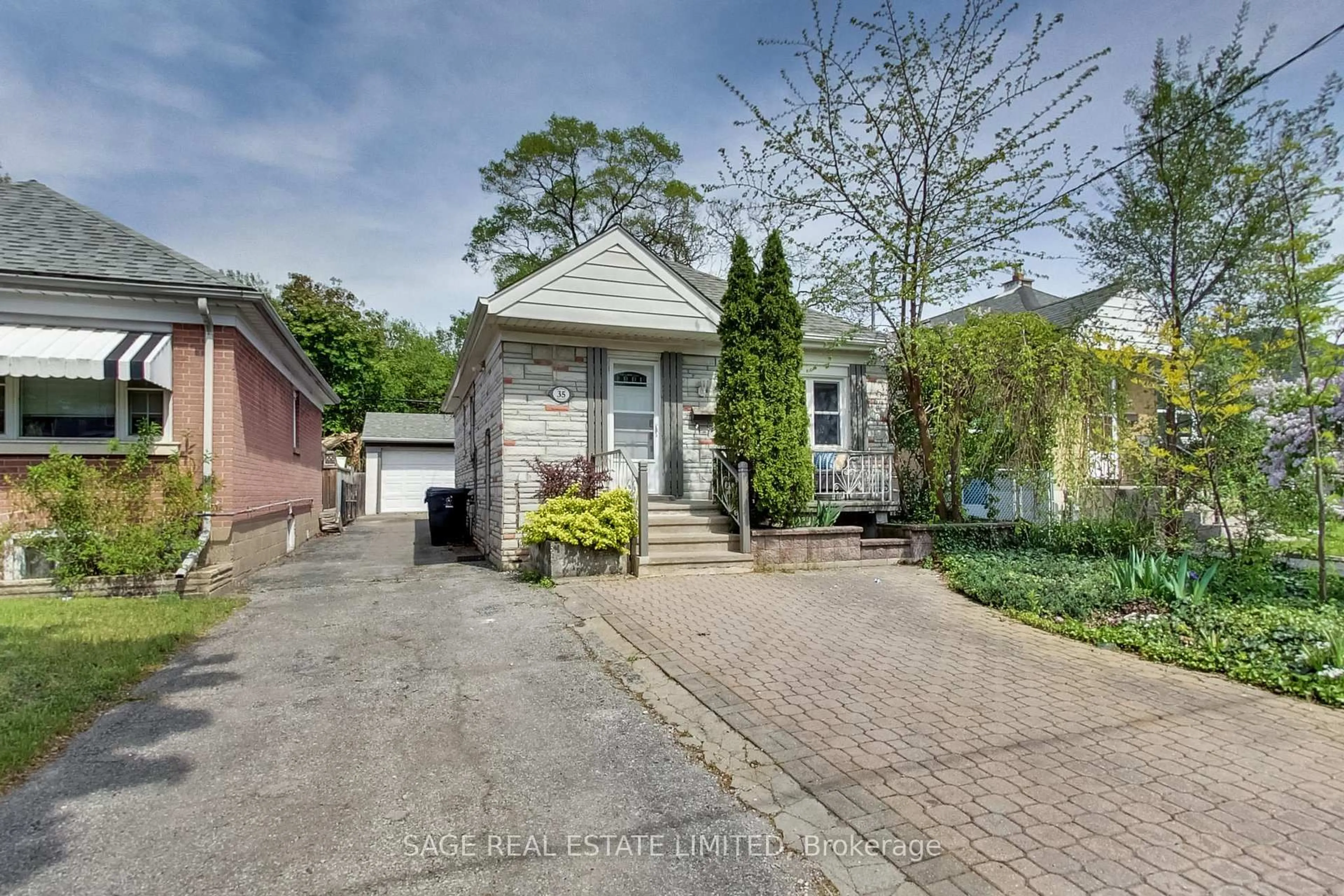 Home with brick exterior material, street for 35 Blakley Ave, Toronto Ontario M6N 3Y4