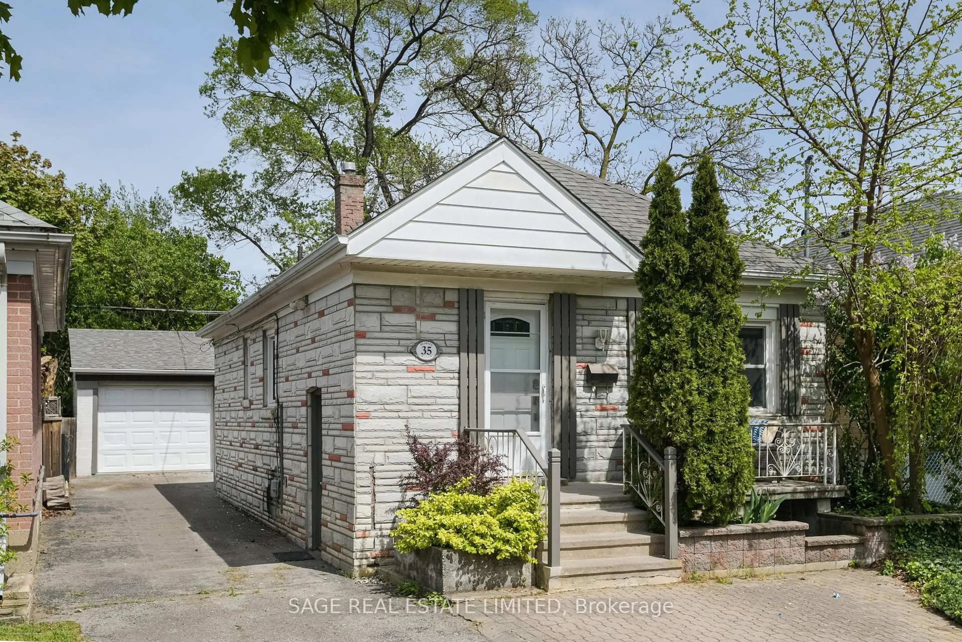 Home with brick exterior material, street for 35 Blakley Ave, Toronto Ontario M6N 3Y4