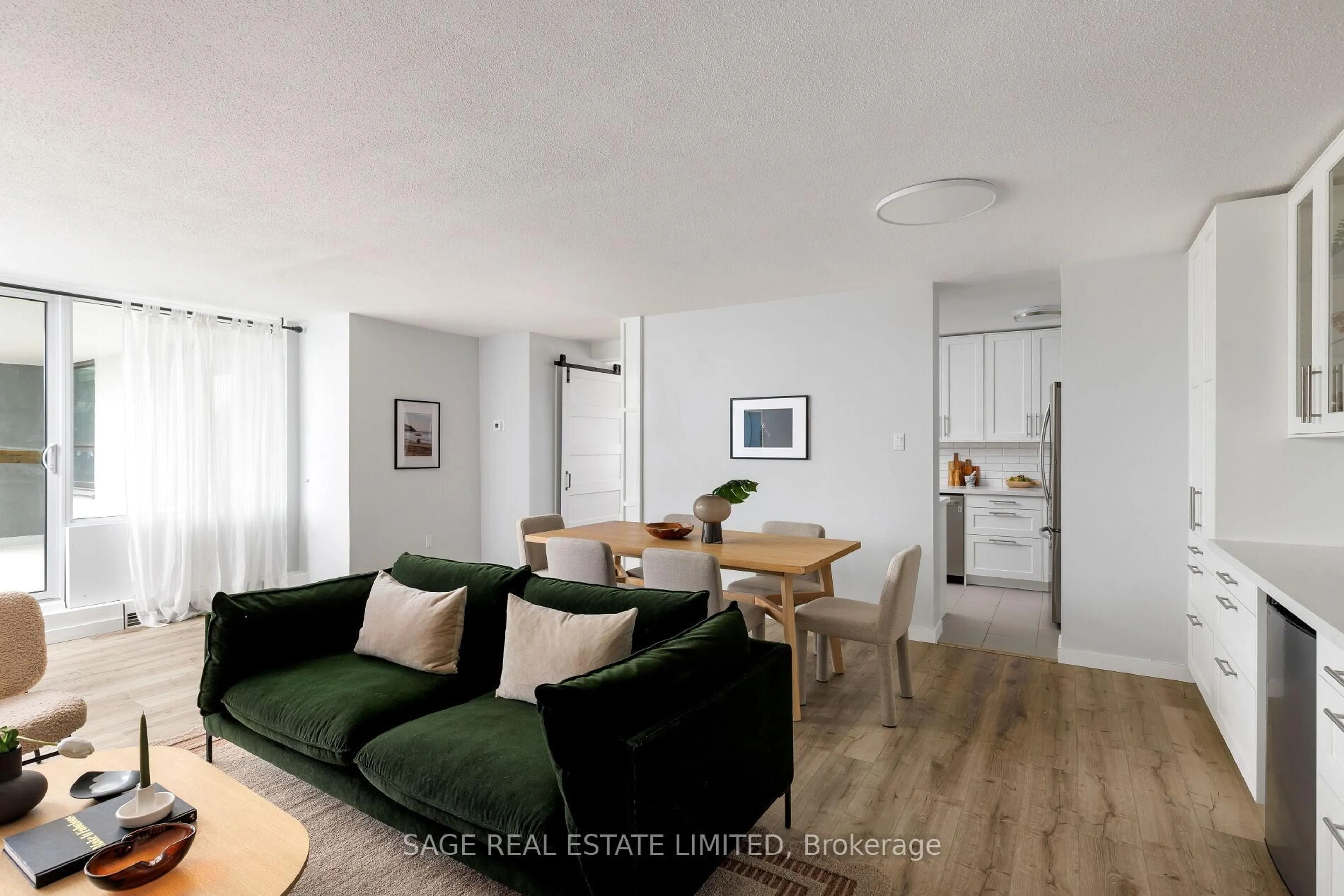 Living room with furniture, wood/laminate floor for 61 Richview Rd #510, Toronto Ontario M9A 4M8