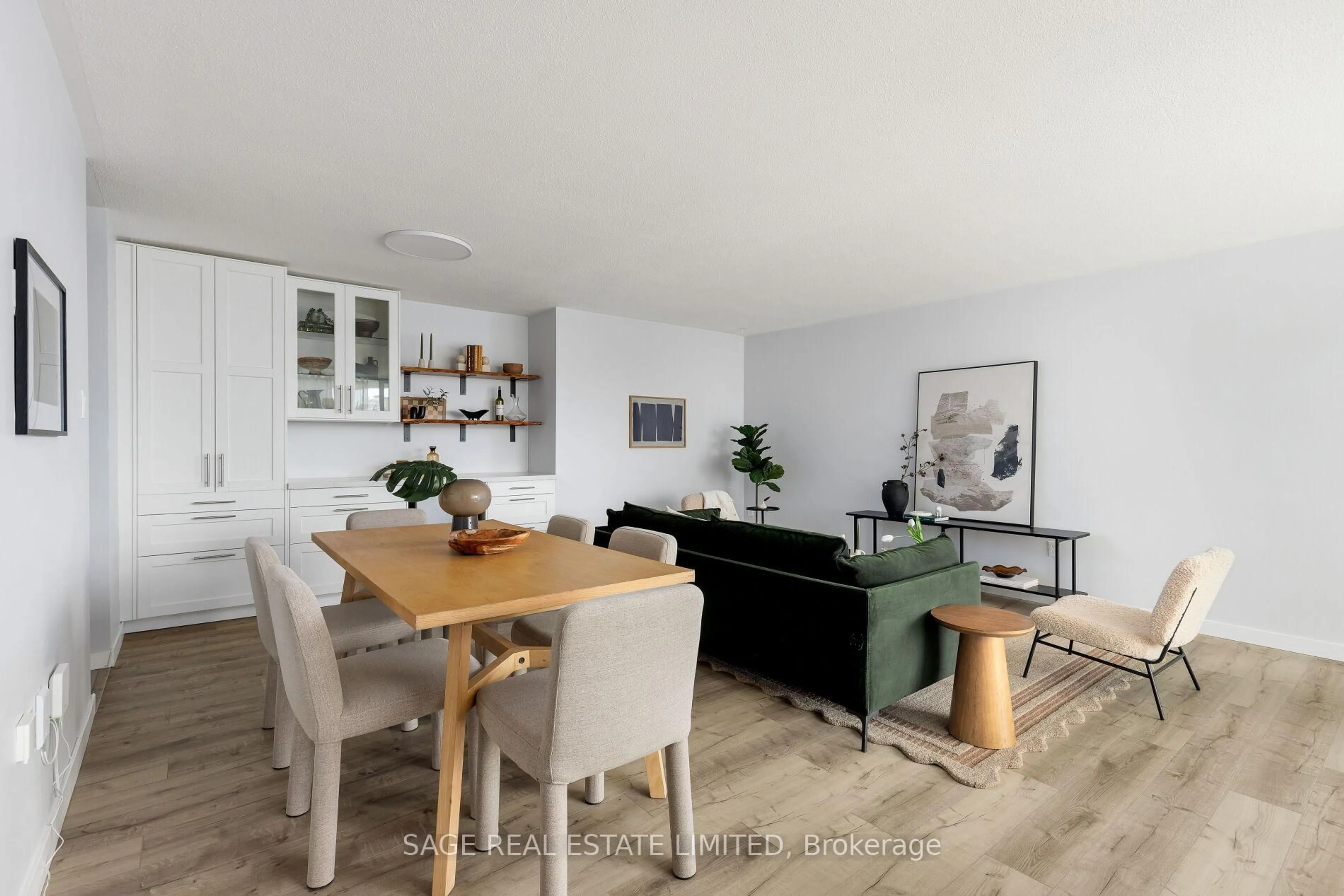 Living room with furniture, wood/laminate floor for 61 Richview Rd #510, Toronto Ontario M9A 4M8
