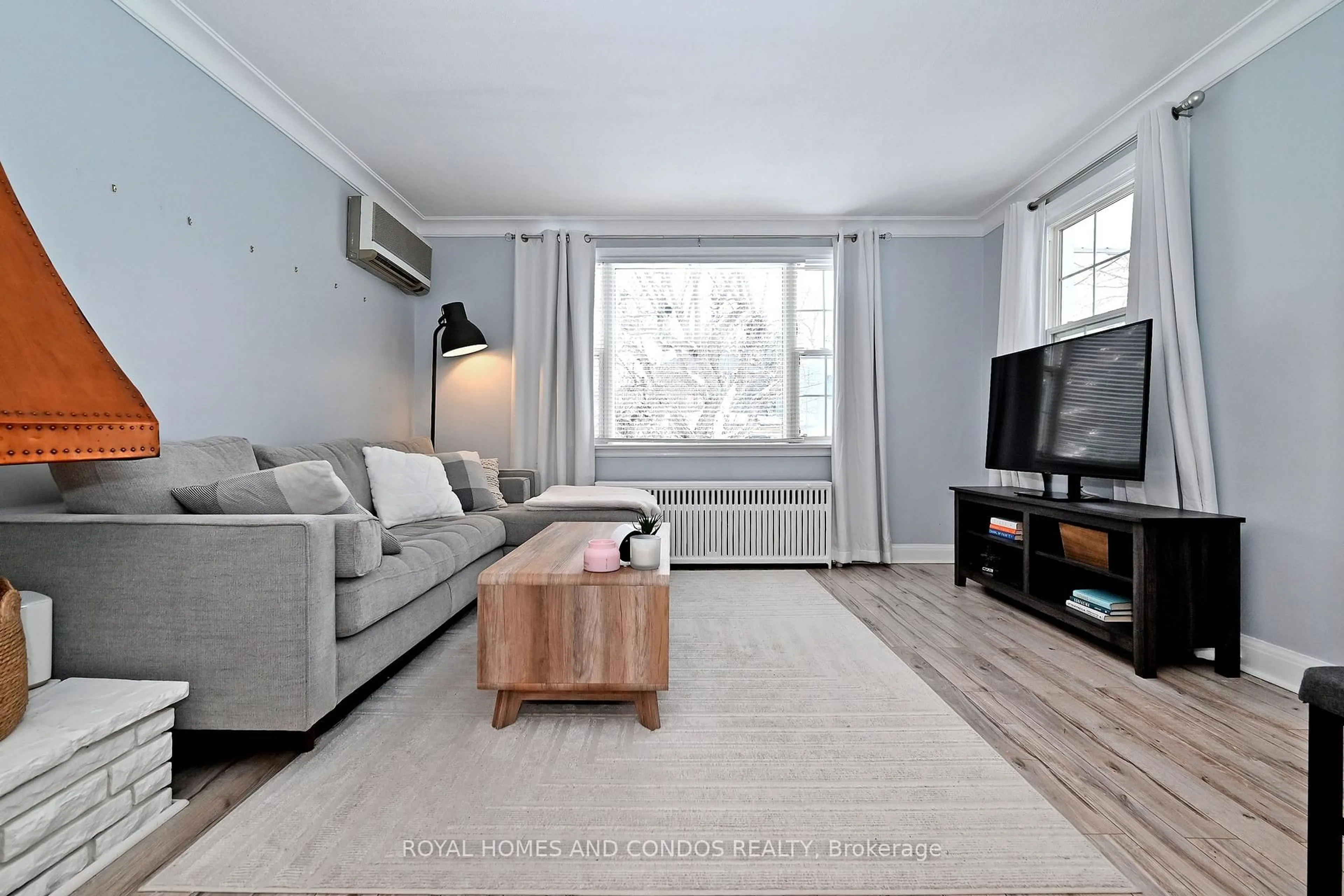 Living room with furniture, unknown for 13 Forty First St, Toronto Ontario M8W 3N4