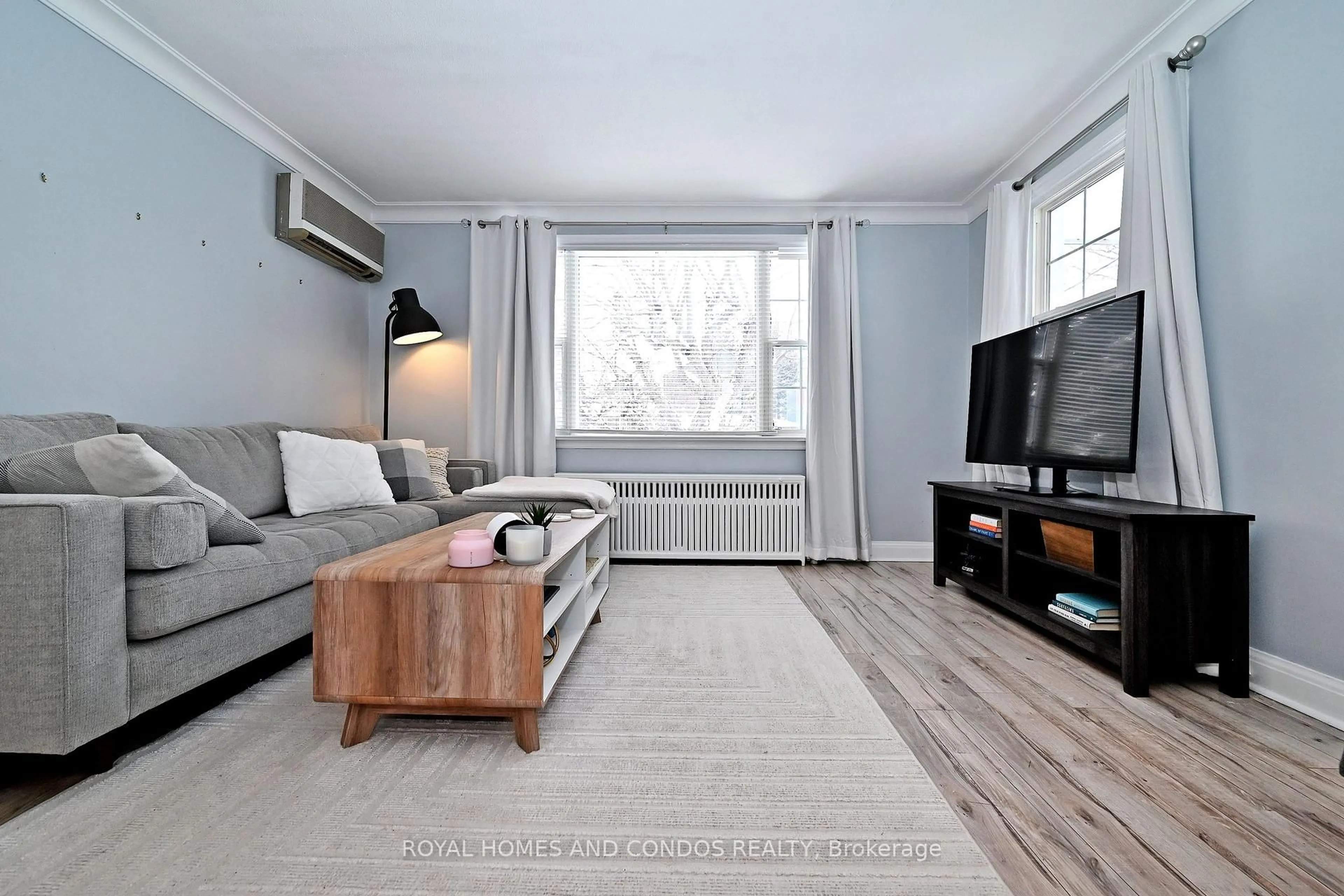 Living room with furniture, unknown for 13 Forty First St, Toronto Ontario M8W 3N4