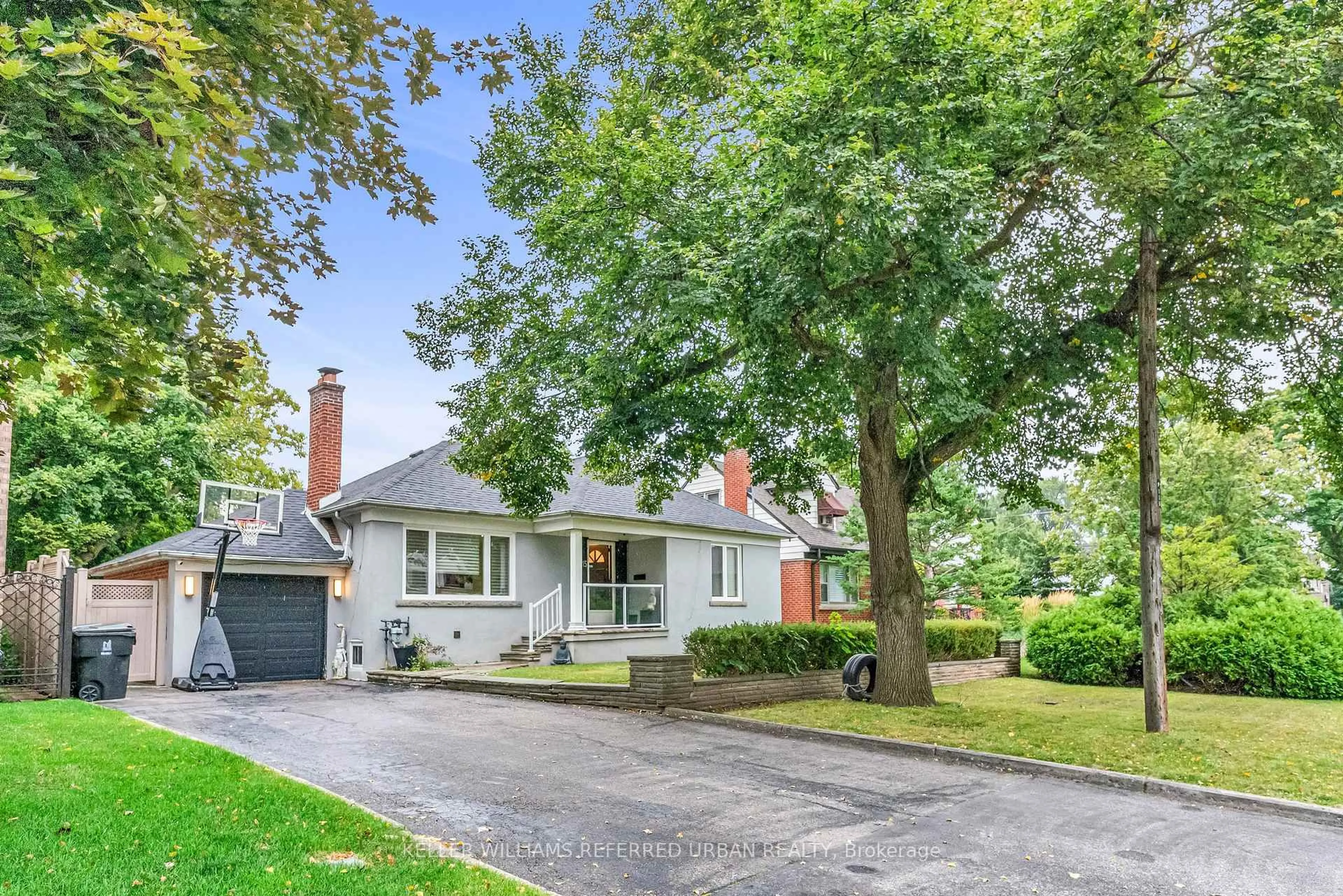Home with brick exterior material, street for 115 Ashbourne Dr, Toronto Ontario M9B 4H9