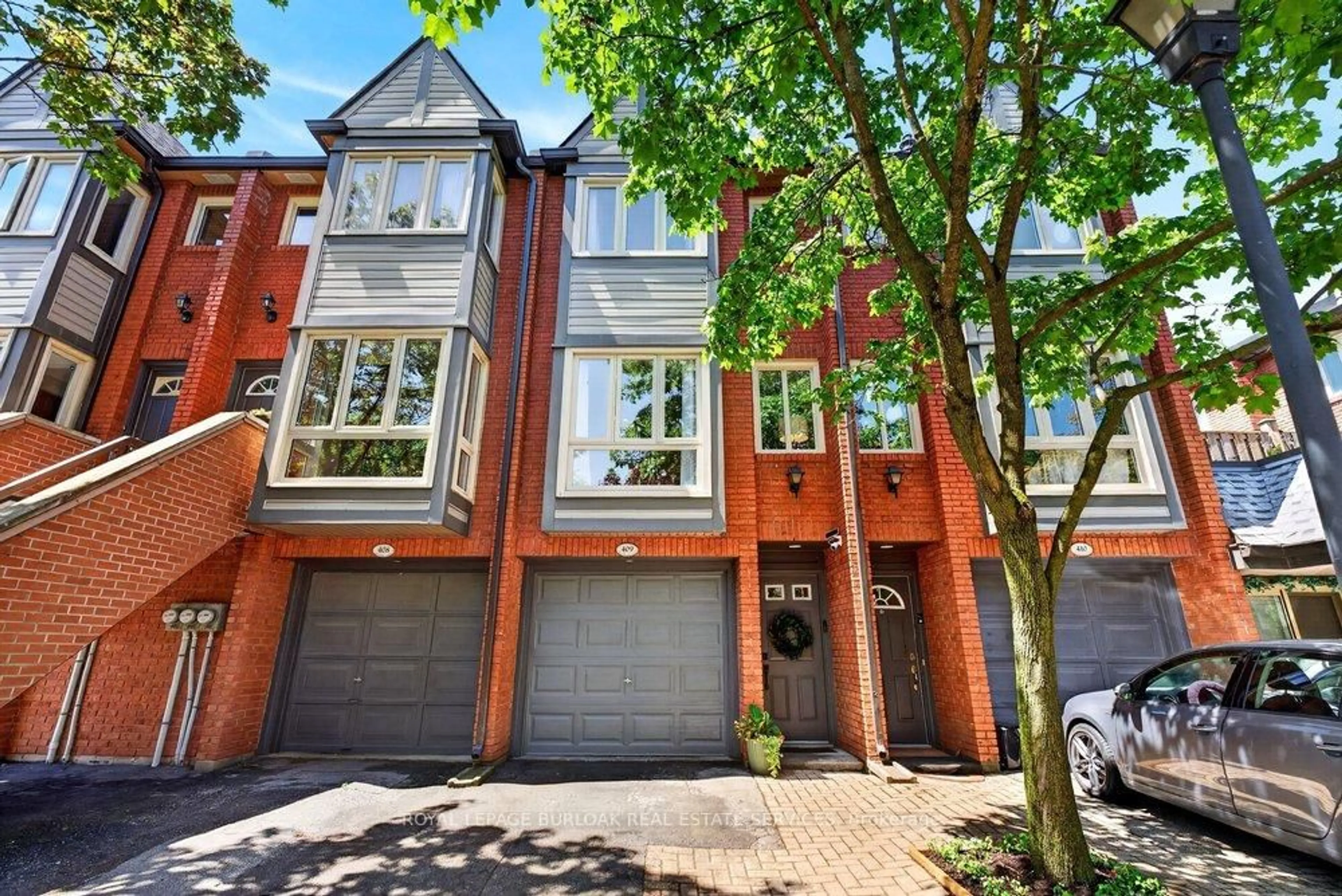 Home with brick exterior material, street for 895 Maple Ave #409, Burlington Ontario L7S 2H7