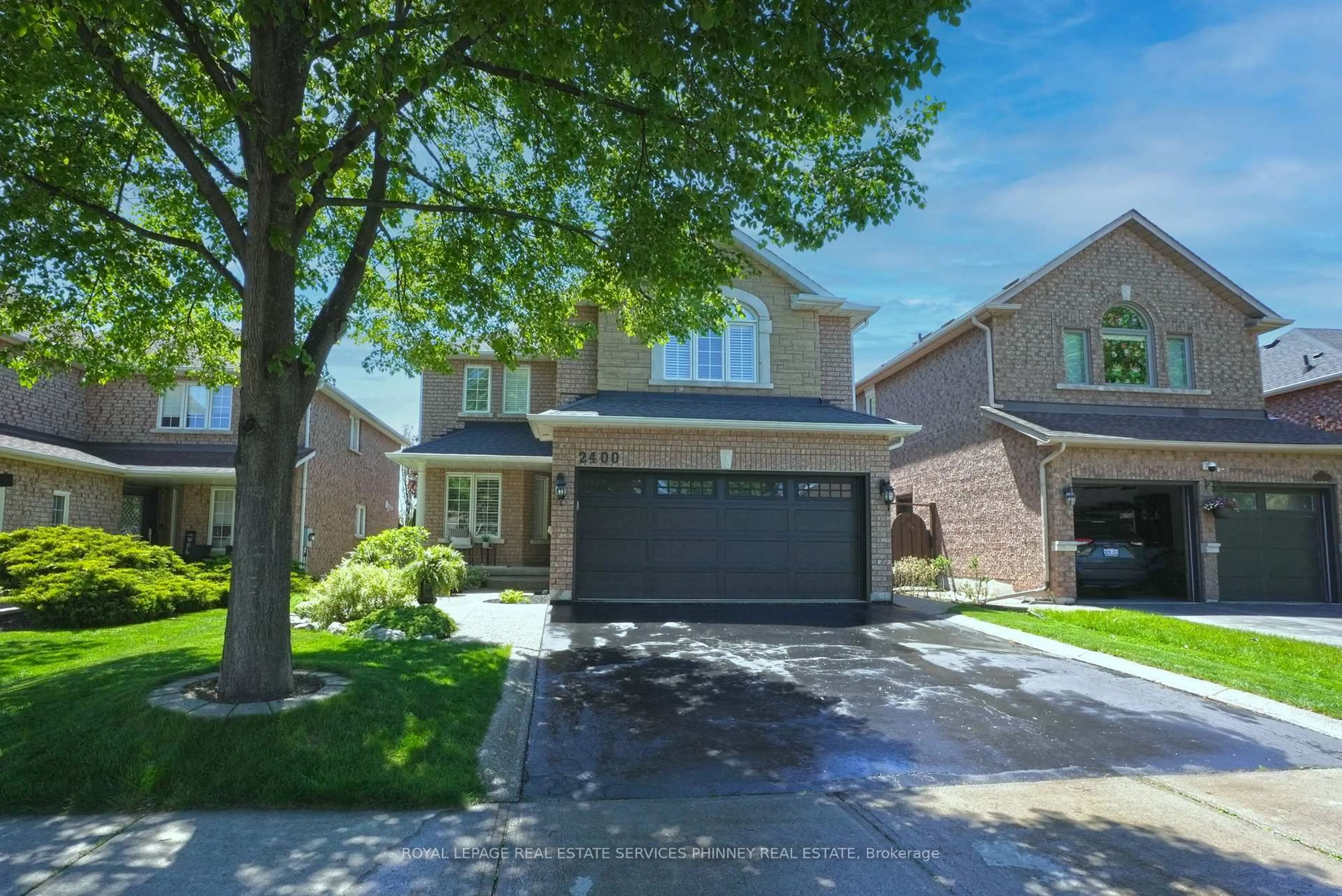 Home with brick exterior material, street for 2400 Eden Valley Dr, Oakville Ontario L6H 6K9