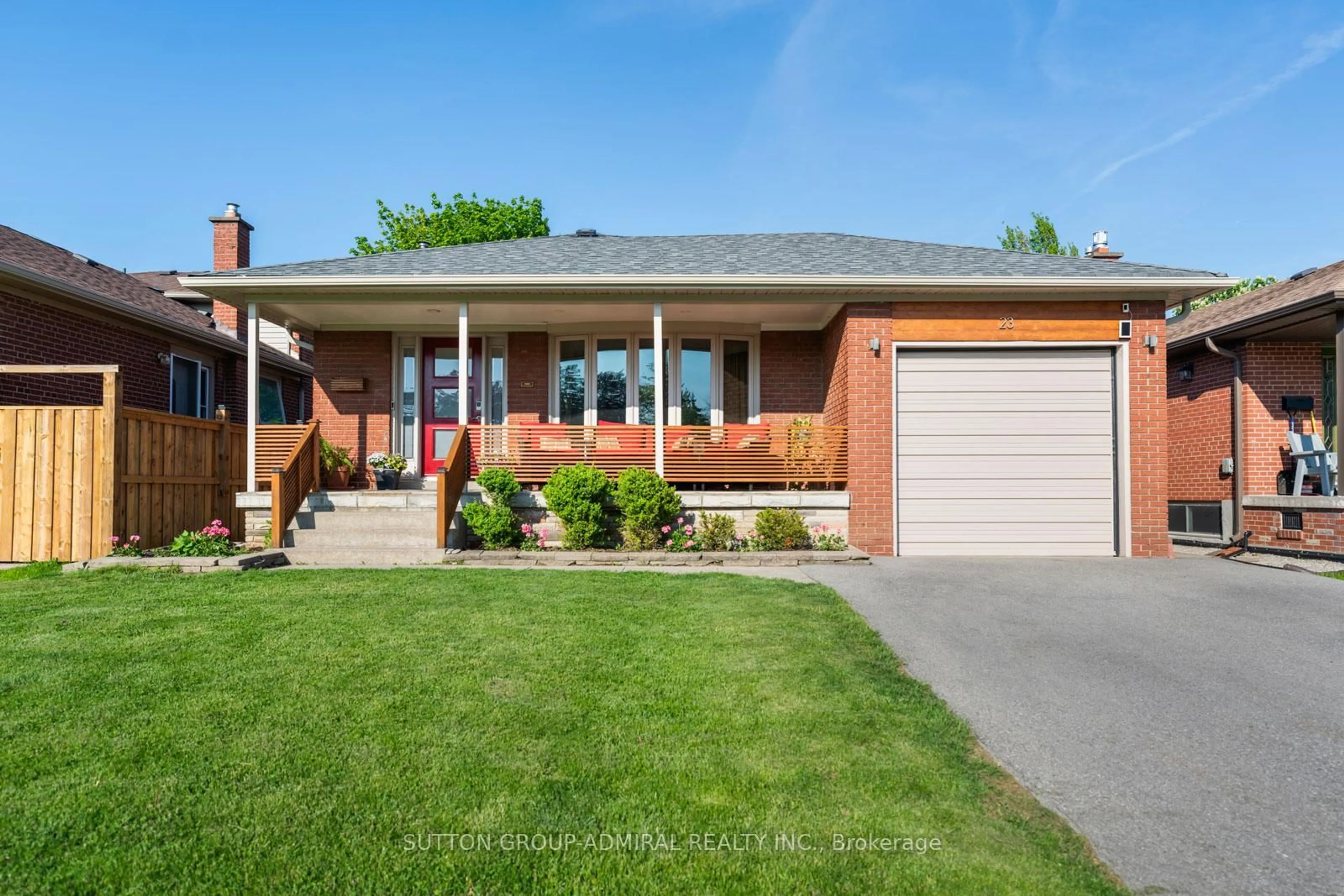Home with brick exterior material, street for 23 Groverdale Rd, Toronto Ontario M9C 3M7
