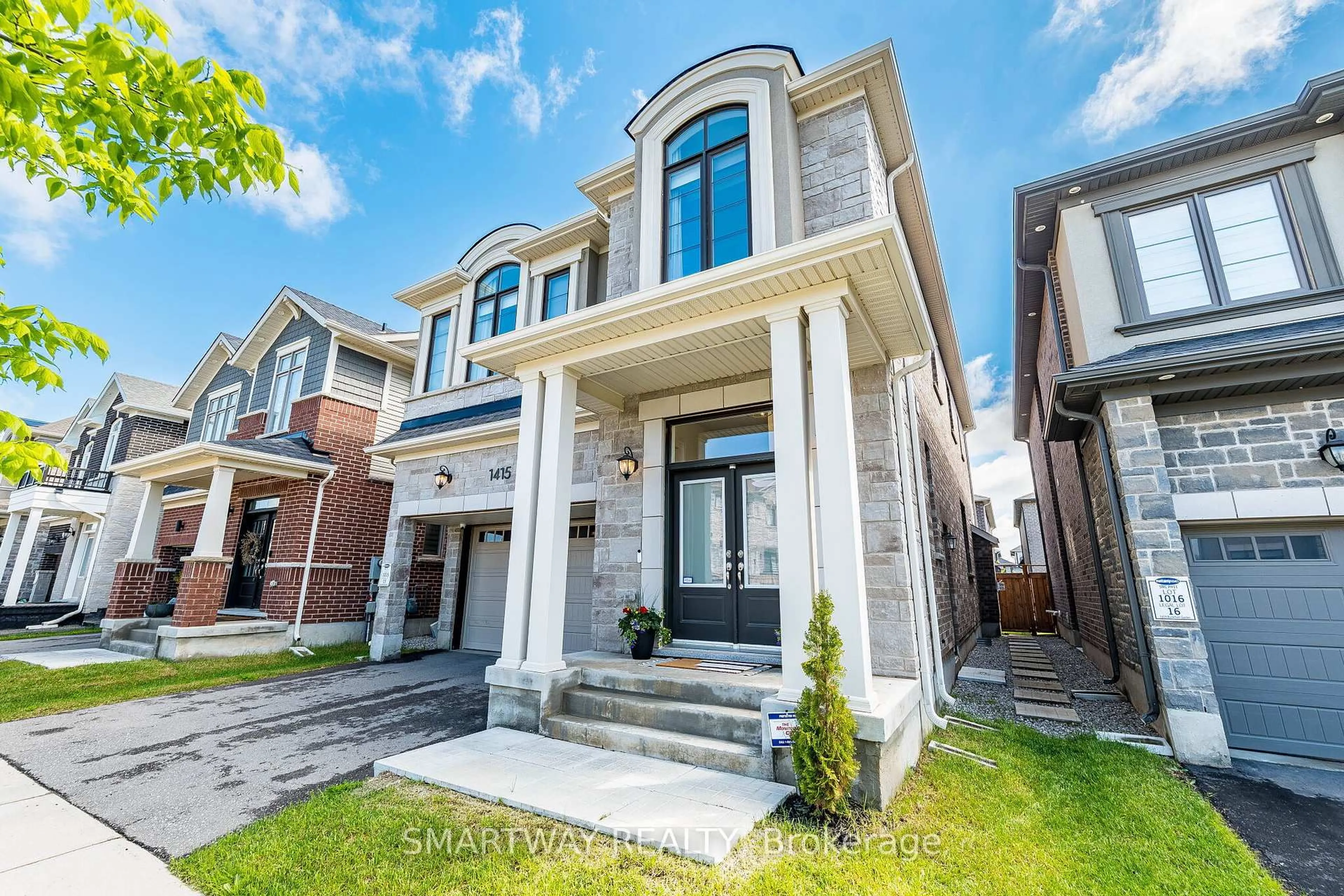 Home with brick exterior material, street for 1415 Buckthorn Garden, Milton Ontario L9E 1P9