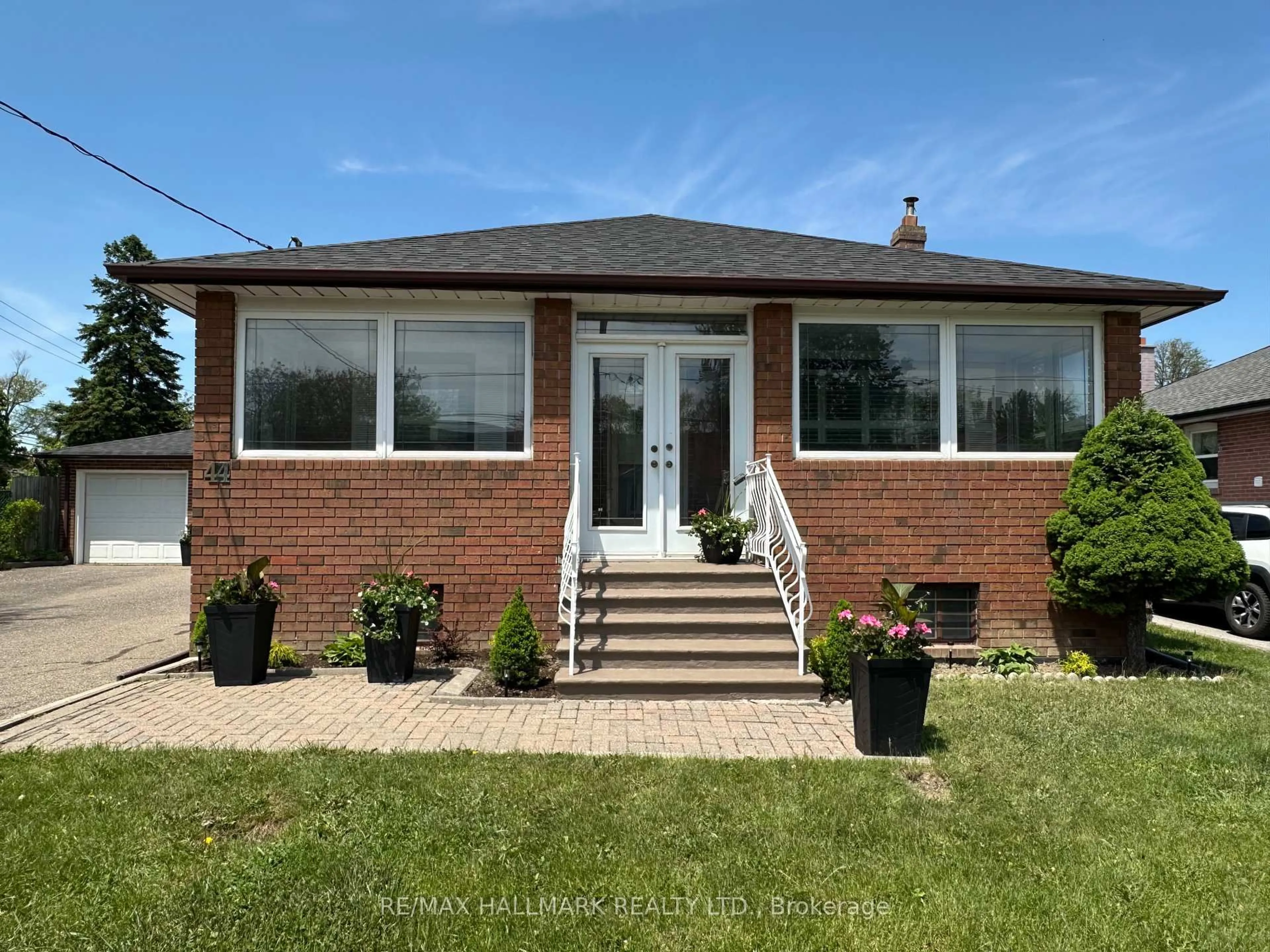 Home with brick exterior material, street for 44 Kirby Rd, Toronto Ontario M3L 1B4