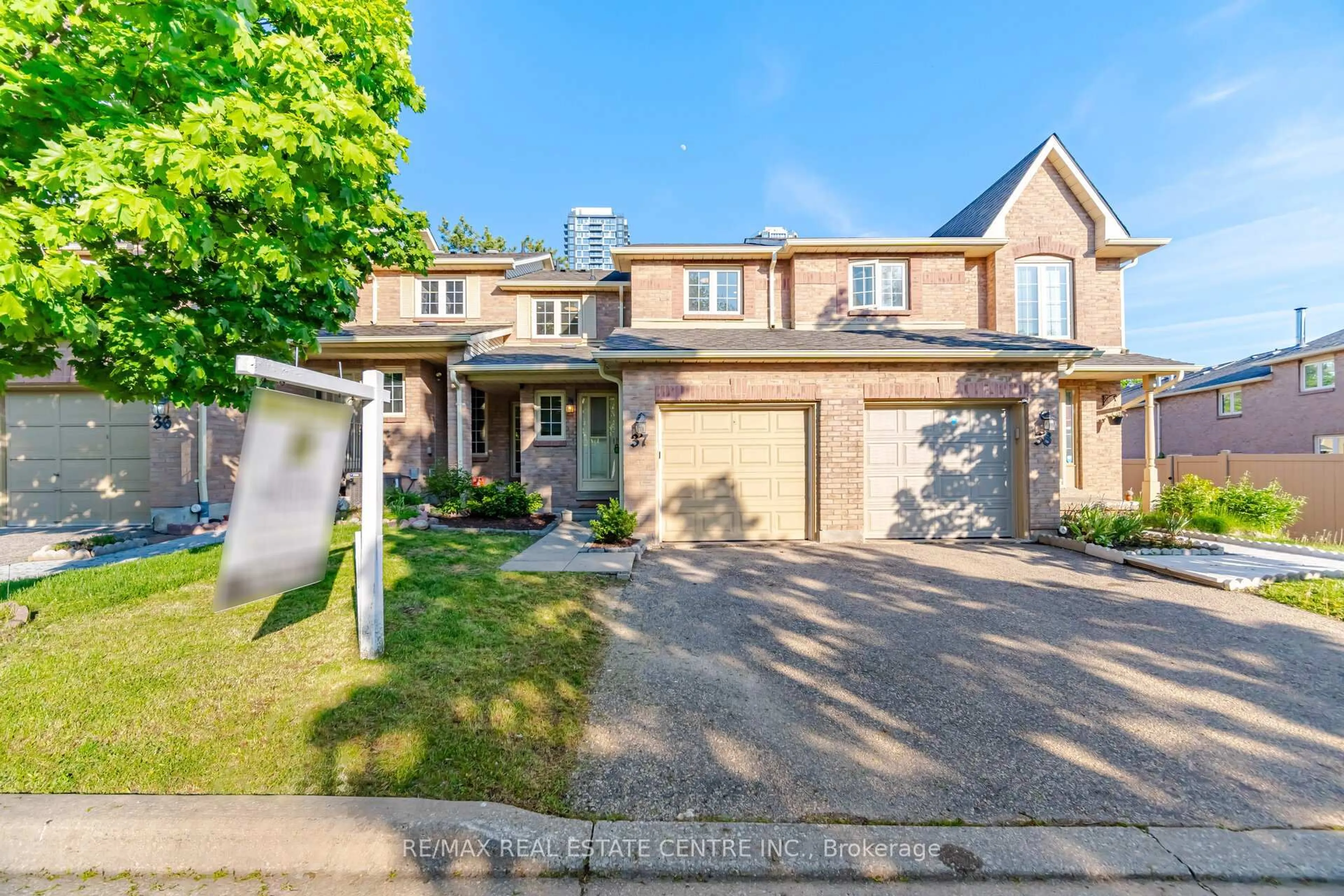 Home with brick exterior material, street for 35 Ceremonial Dr #37, Mississauga Ontario L5R 3G6