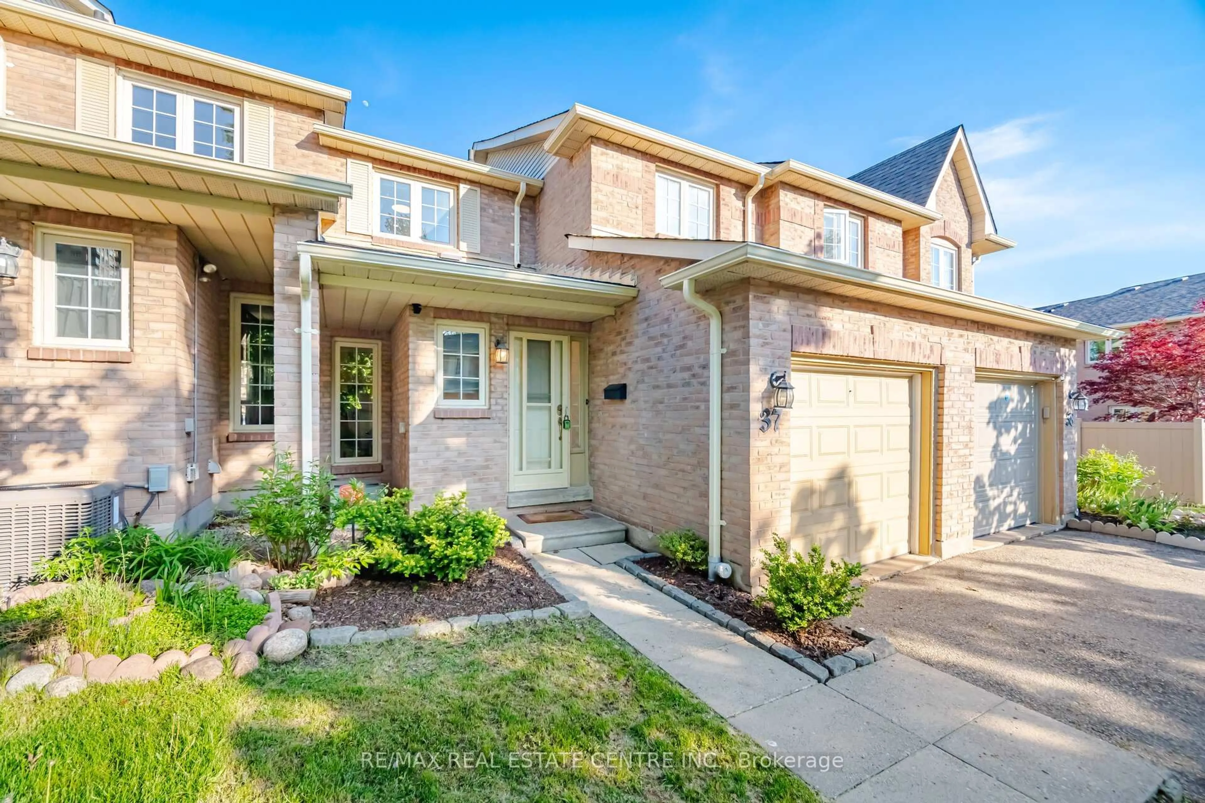Home with brick exterior material, street for 35 Ceremonial Dr #37, Mississauga Ontario L5R 3G6