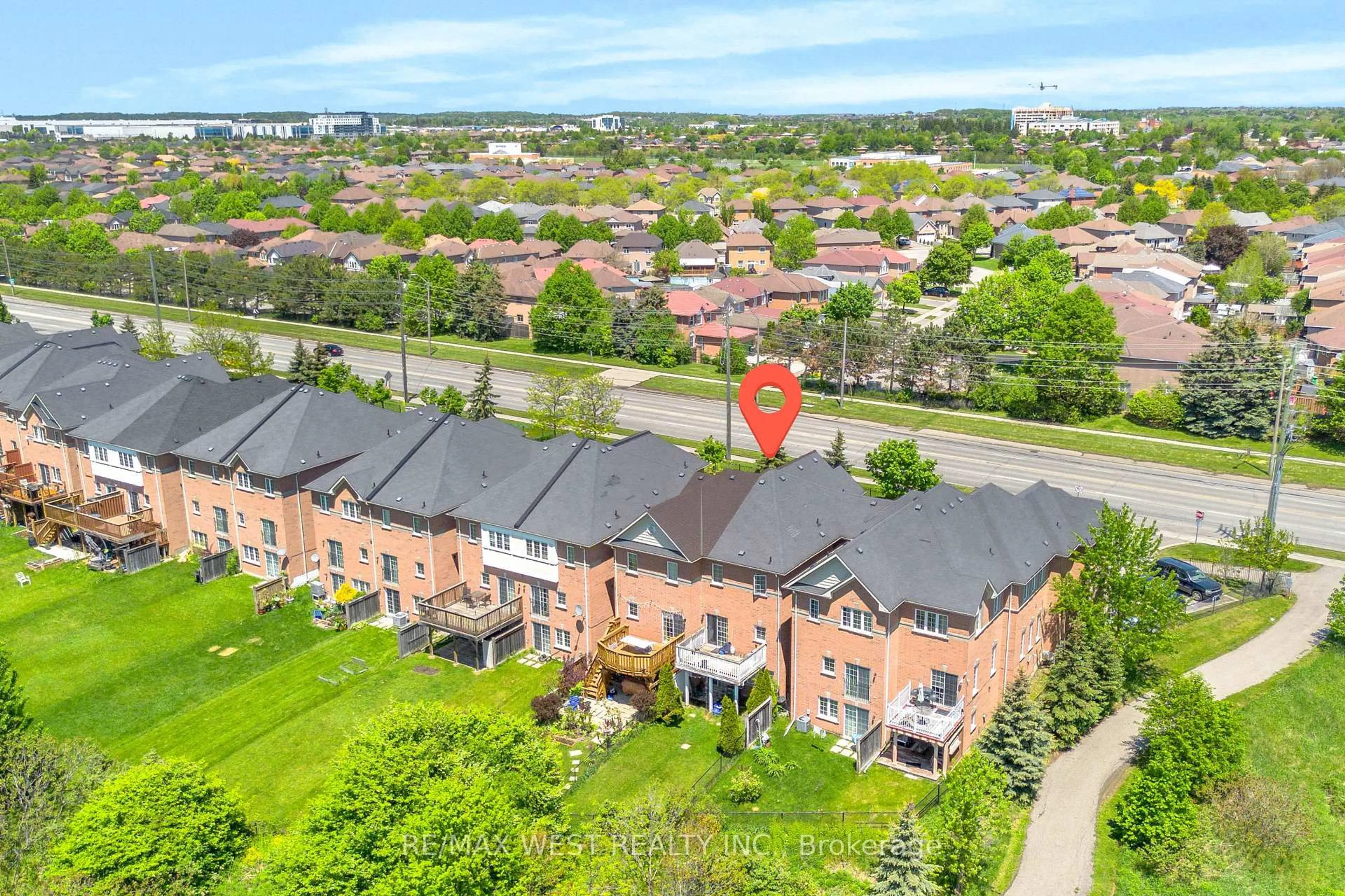 A pic from outside/outdoor area/front of a property/back of a property/a pic from drone, unknown for 9704 Mclaughlin Rd #3, Brampton Ontario L6X 0T8