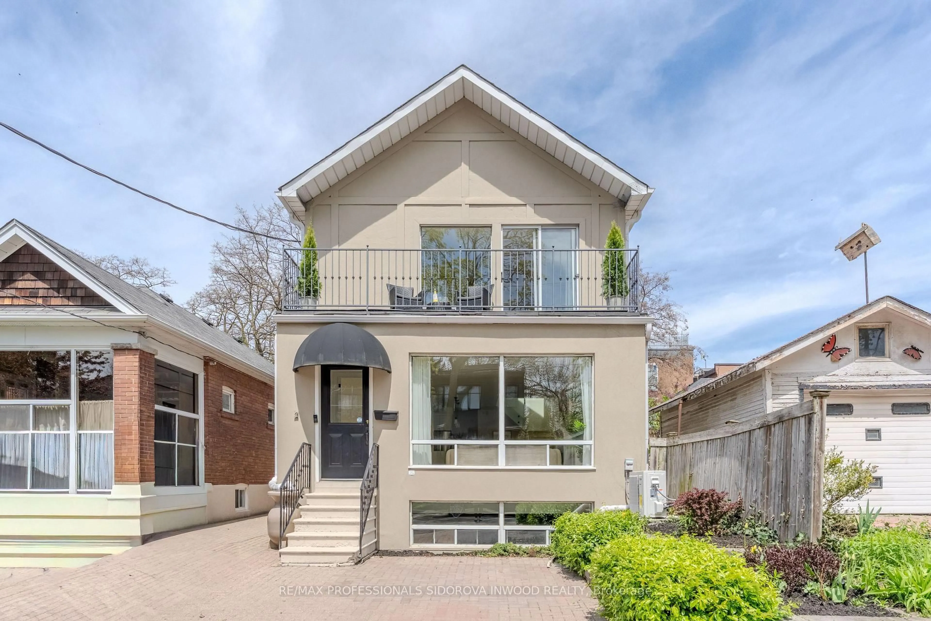 Home with brick exterior material, street for 2 Ostend Ave, Toronto Ontario M6S 1L4
