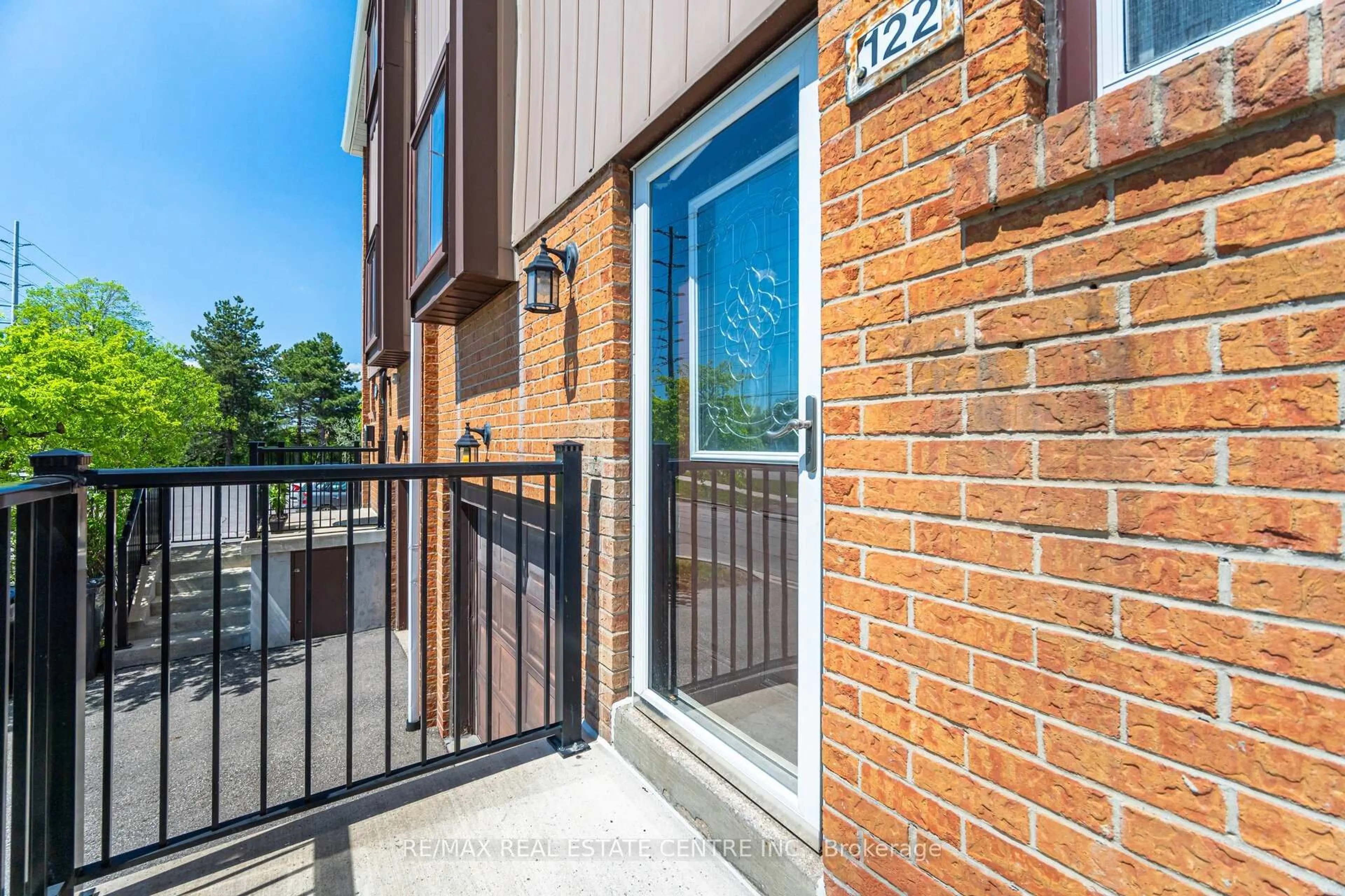 Home with brick exterior material, street for 122 Moregate Cres, Brampton Ontario L6S 3K9