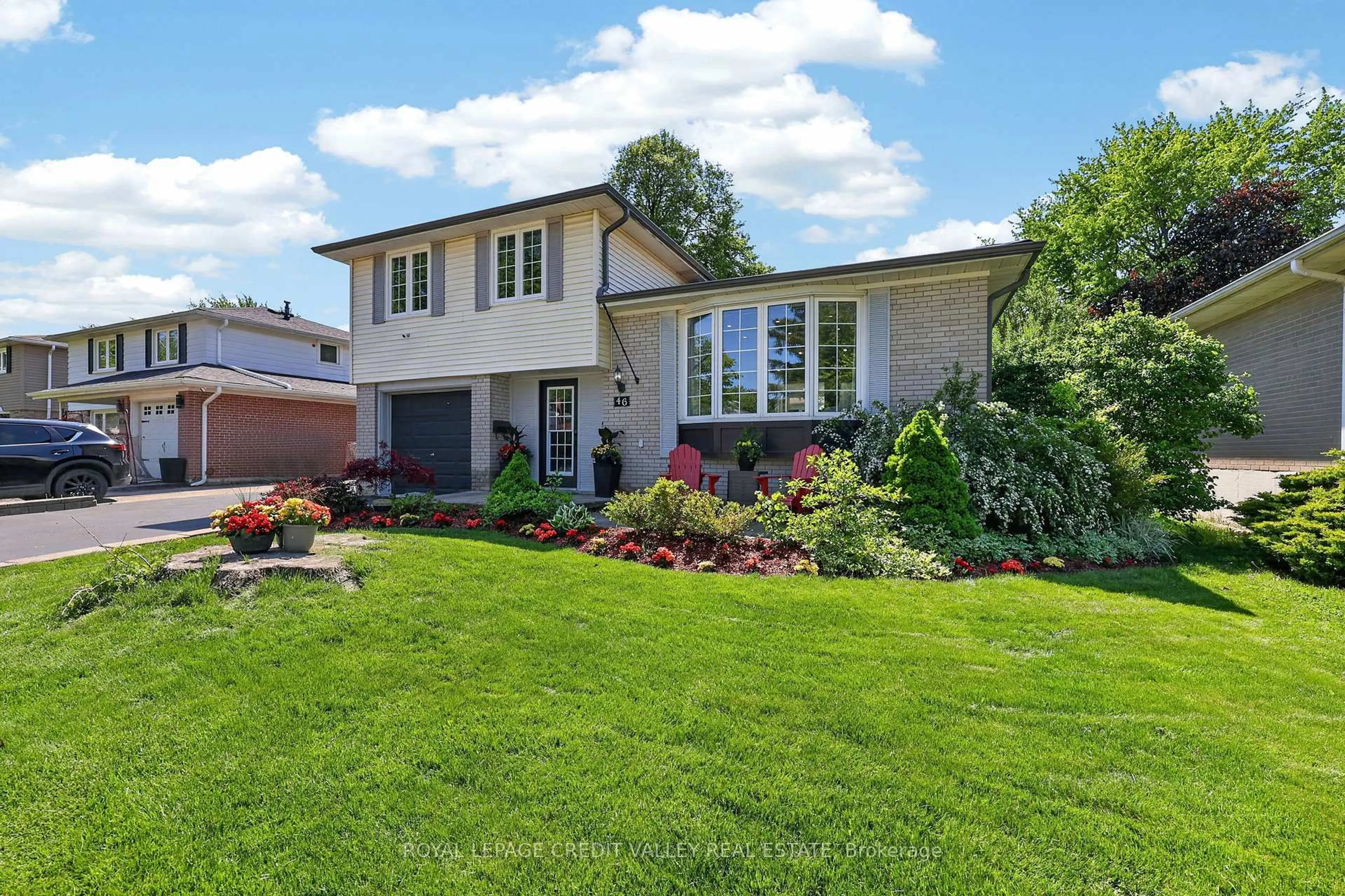 Home with brick exterior material, street for 46 Duncan Bull Dr, Brampton Ontario L6W 1H6