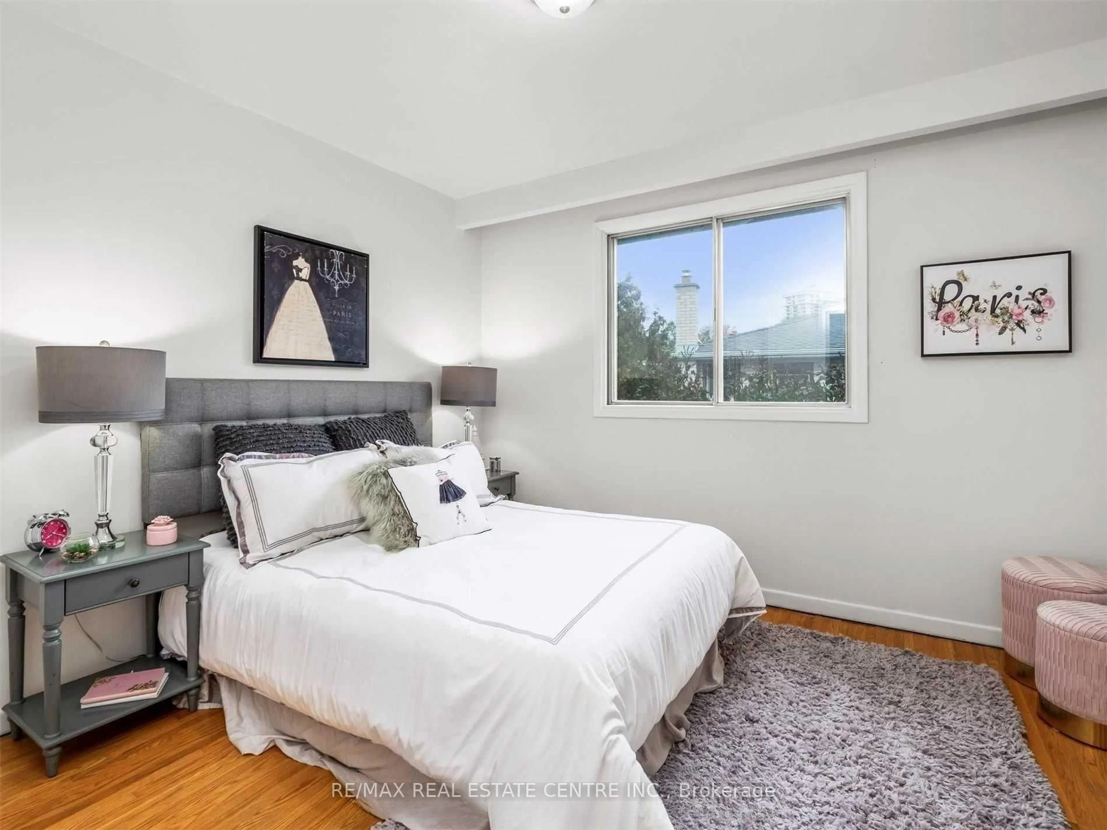 Bedroom with bed, wood/laminate floor for 3574 Golden Orchard Dr, Mississauga Ontario L4Y 3H8
