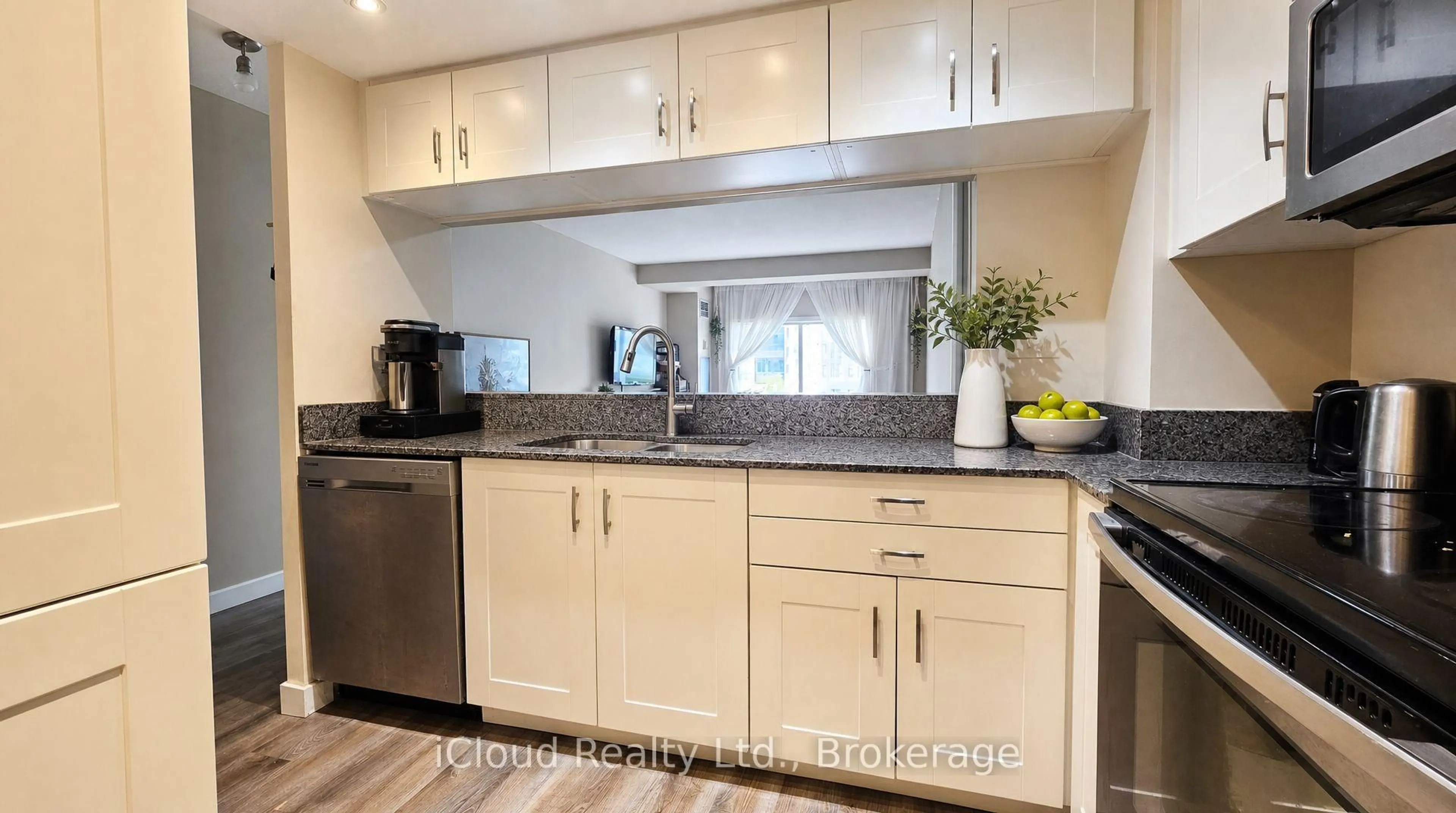 Standard kitchen, wood/laminate floor for 101 Subway Cres #302, Toronto Ontario M9B 6K4