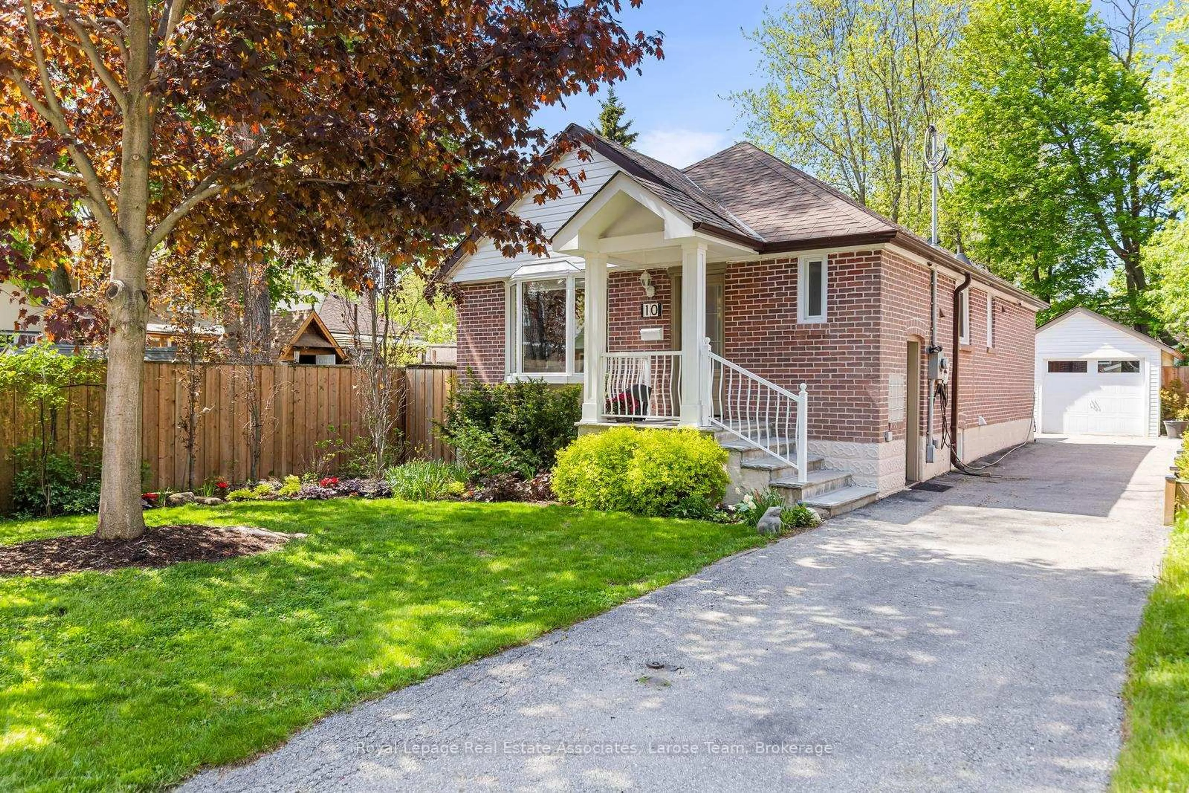 Home with brick exterior material, street for 10 Iris Rd, Toronto Ontario M8V 2G9